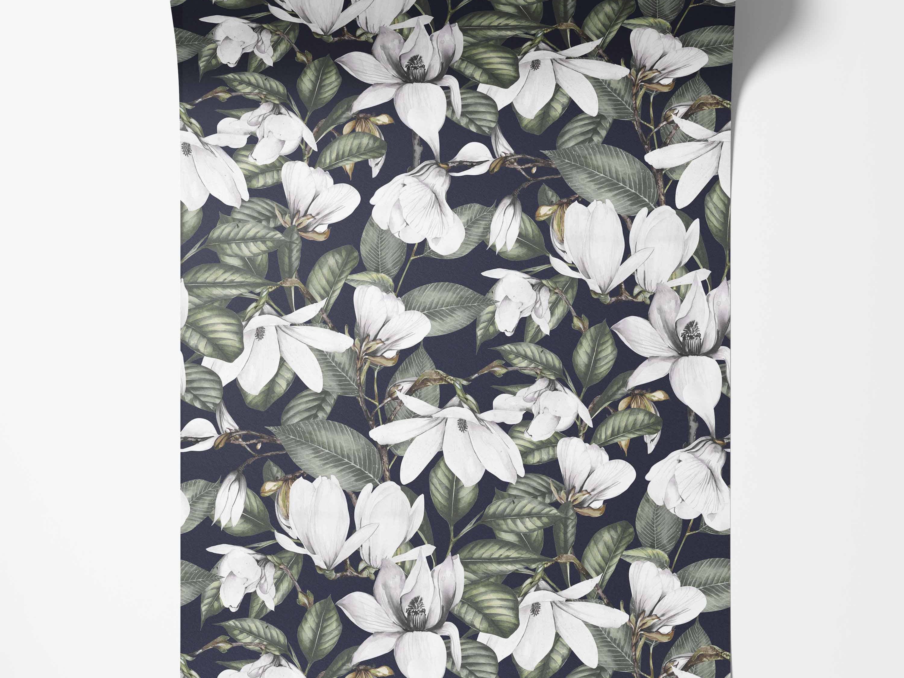Wallpaper featuring illustrated white magnolia flowers and green leaves on a dark background.