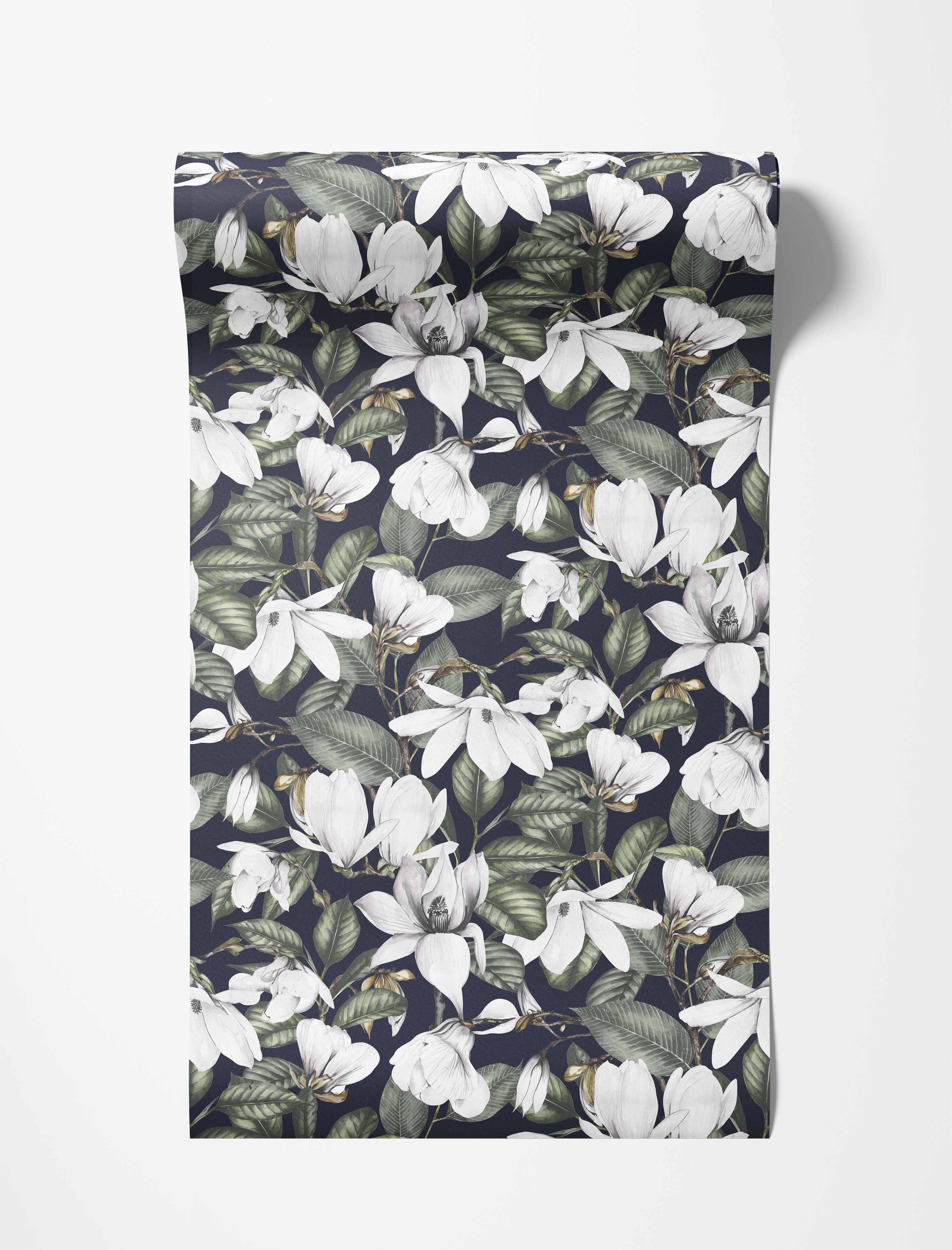 Wallpaper featuring illustrated white magnolia flowers and green leaves on a dark background.