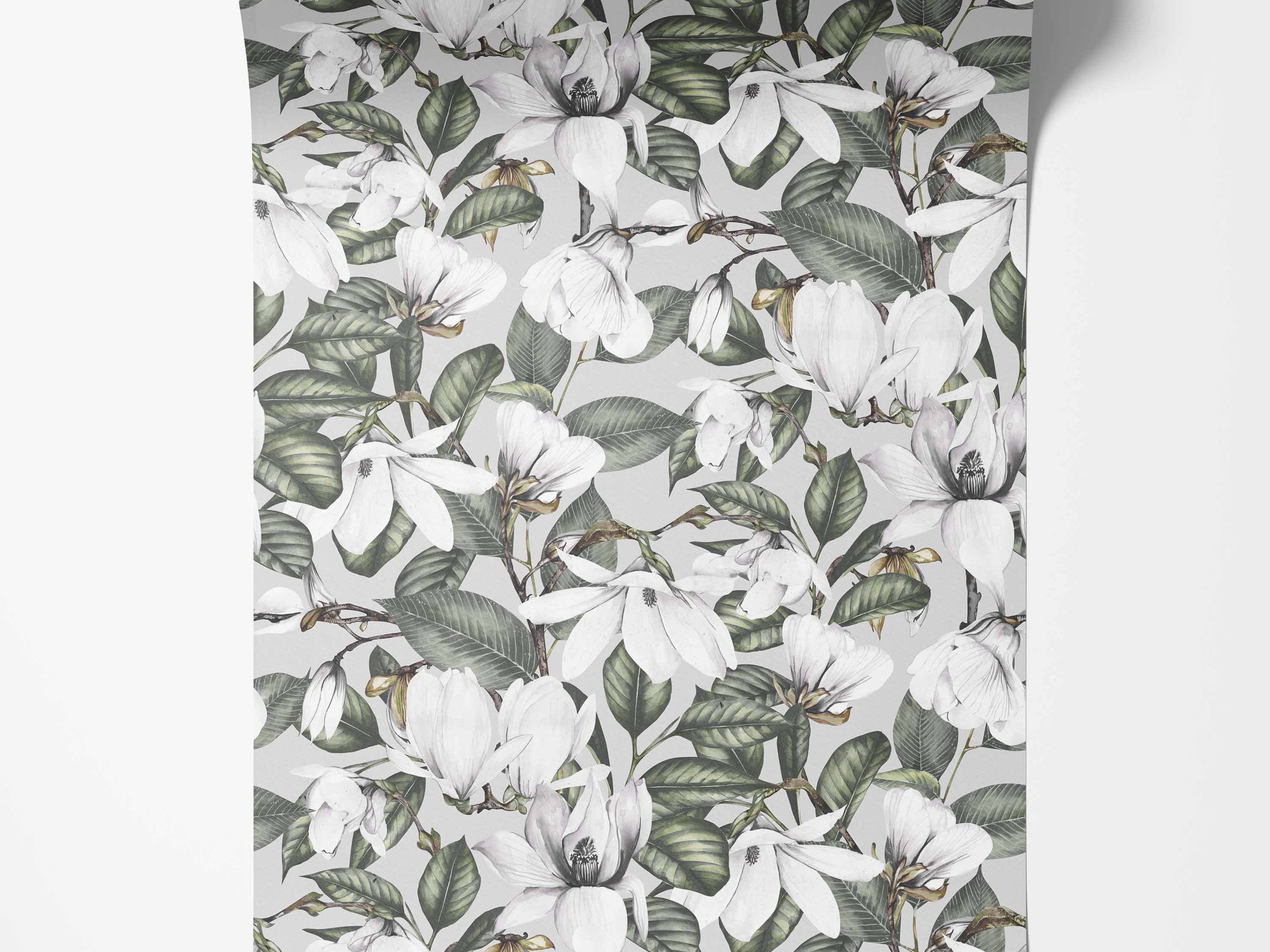 Wallpaper featuring illustrated white magnolia blooms and green leaves against a light gray backdrop.