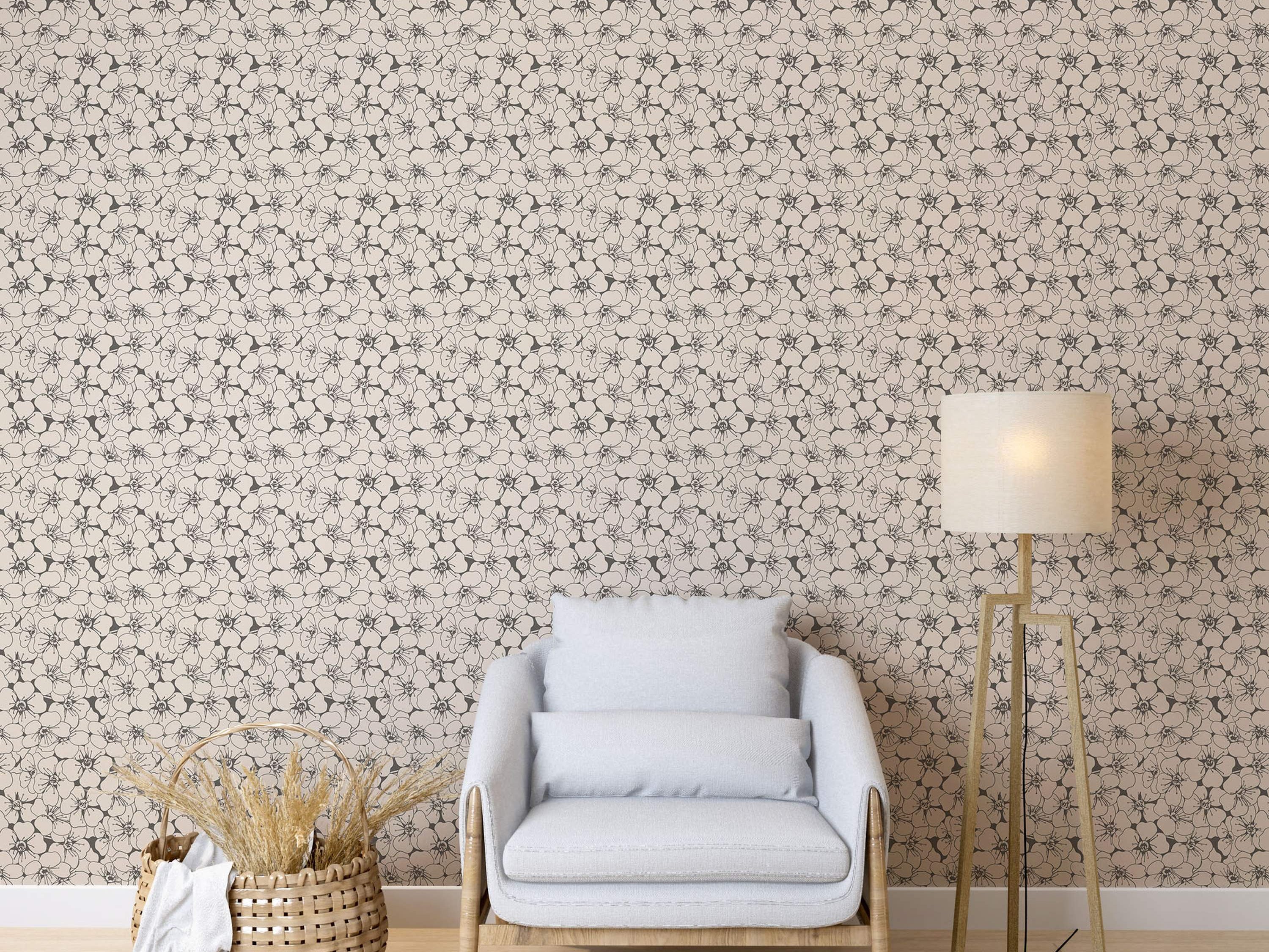 Beige wallpaper with a repeating pattern of simple, black outlined flowers.