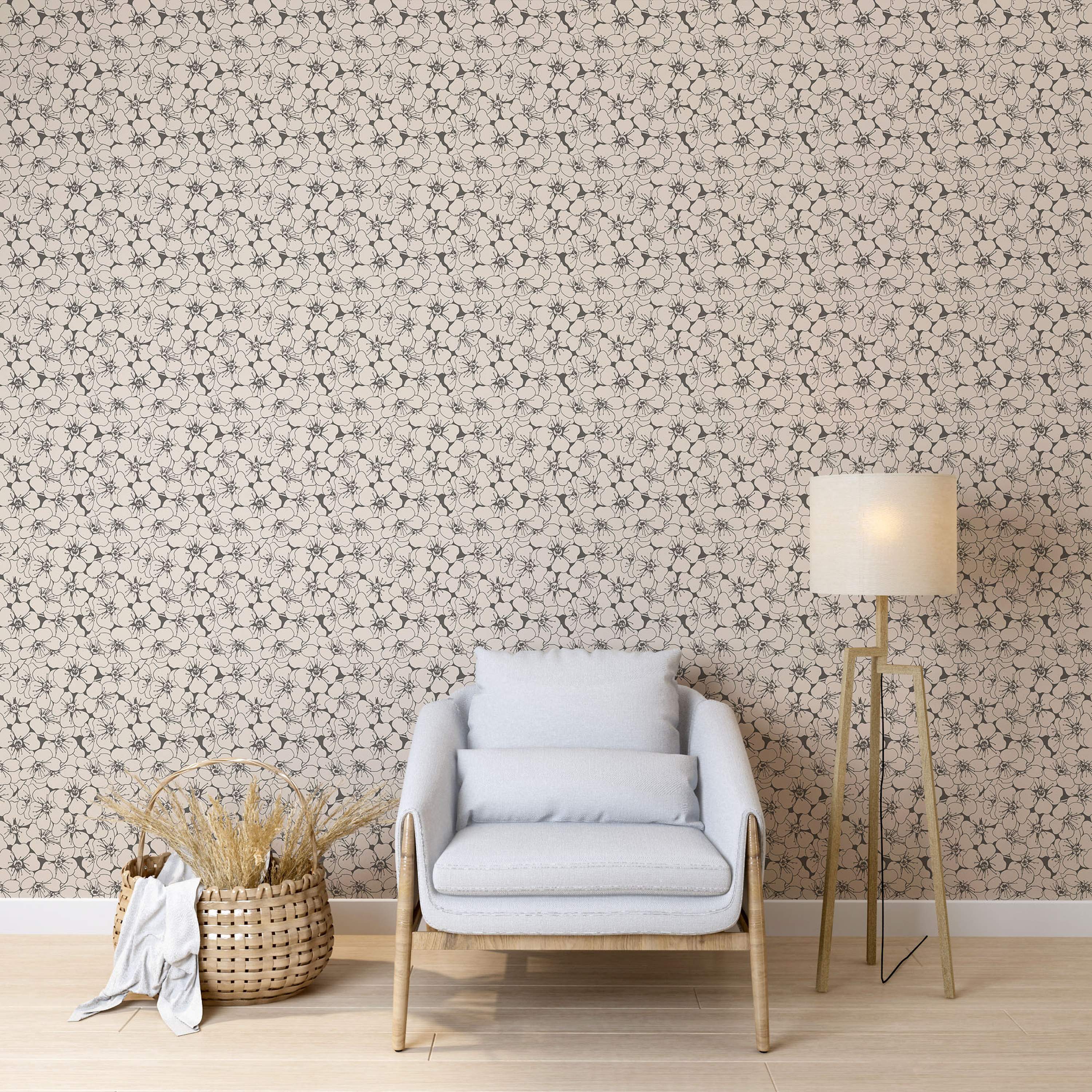 Beige wallpaper with a repeating pattern of simple, black outlined flowers.