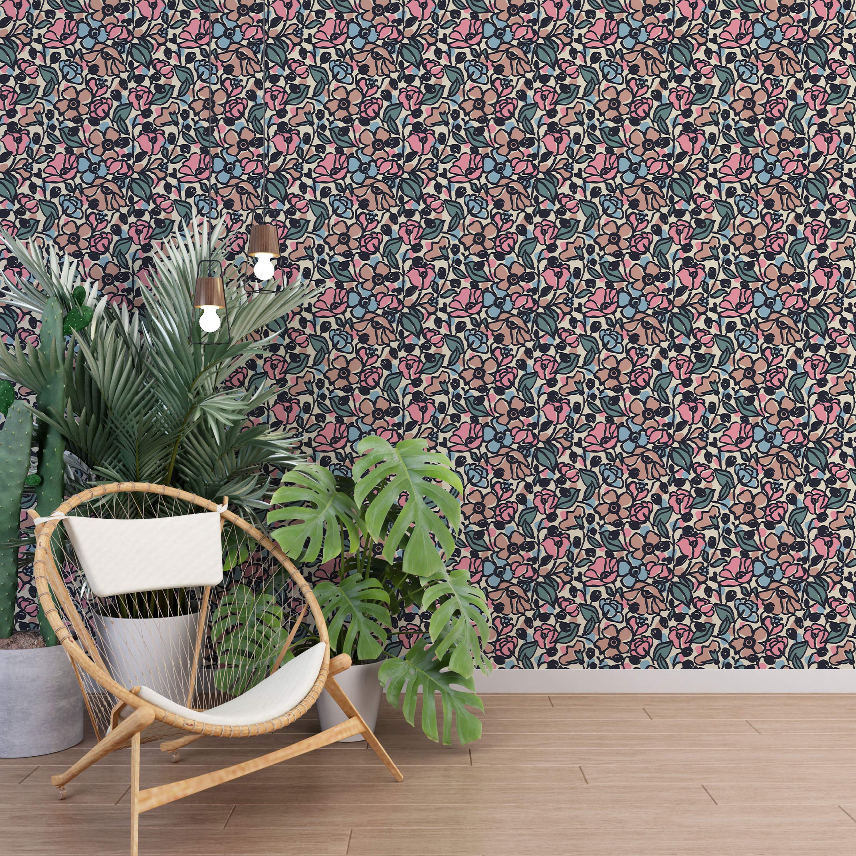Stylized floral wallpaper with pink, blue, tan, and teal flowers and leaves outlined in dark navy on a cream background.
