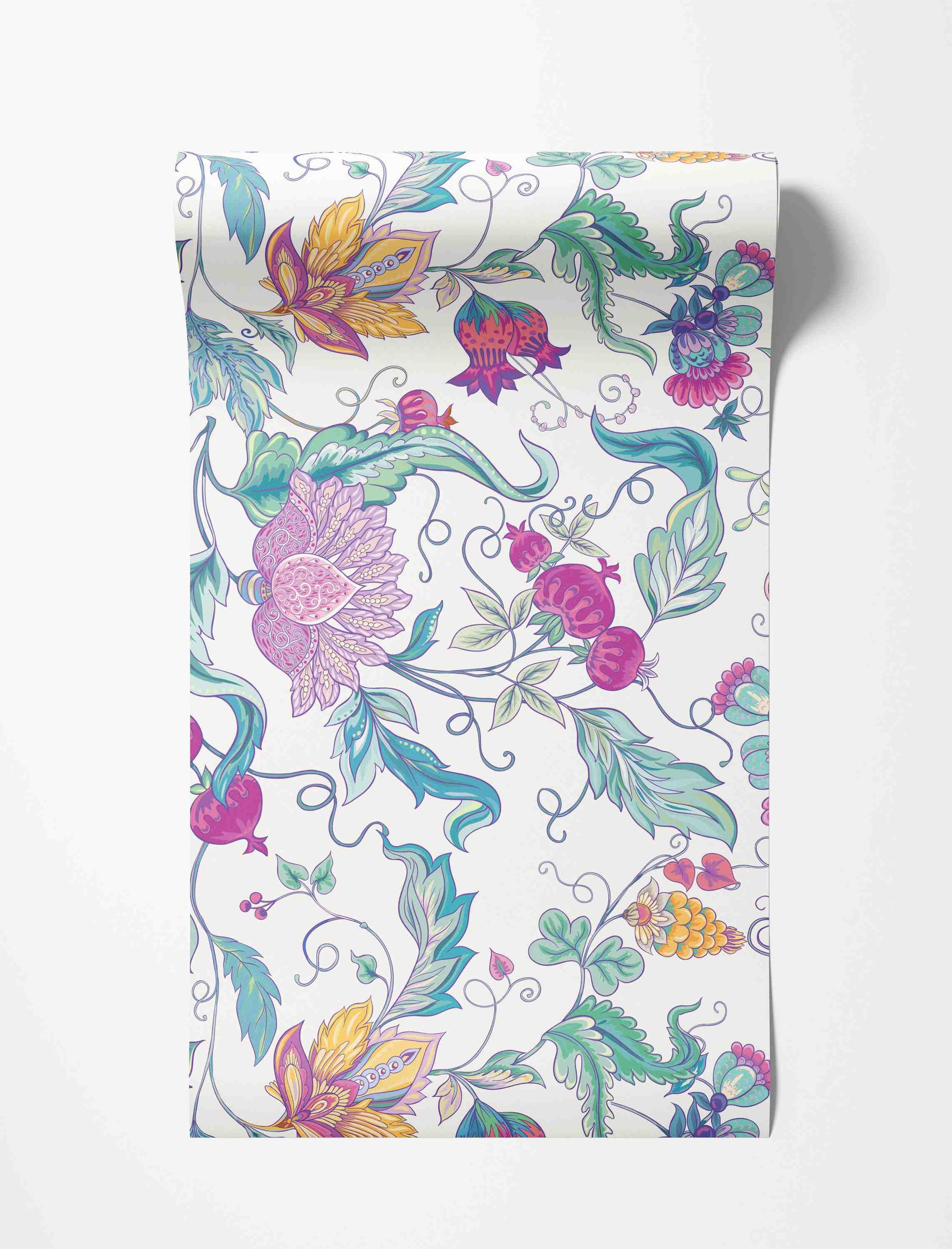Stylized botanical wallpaper with floral, paisley, and pomegranate motifs in pink, teal, purple, and yellow on a white background.