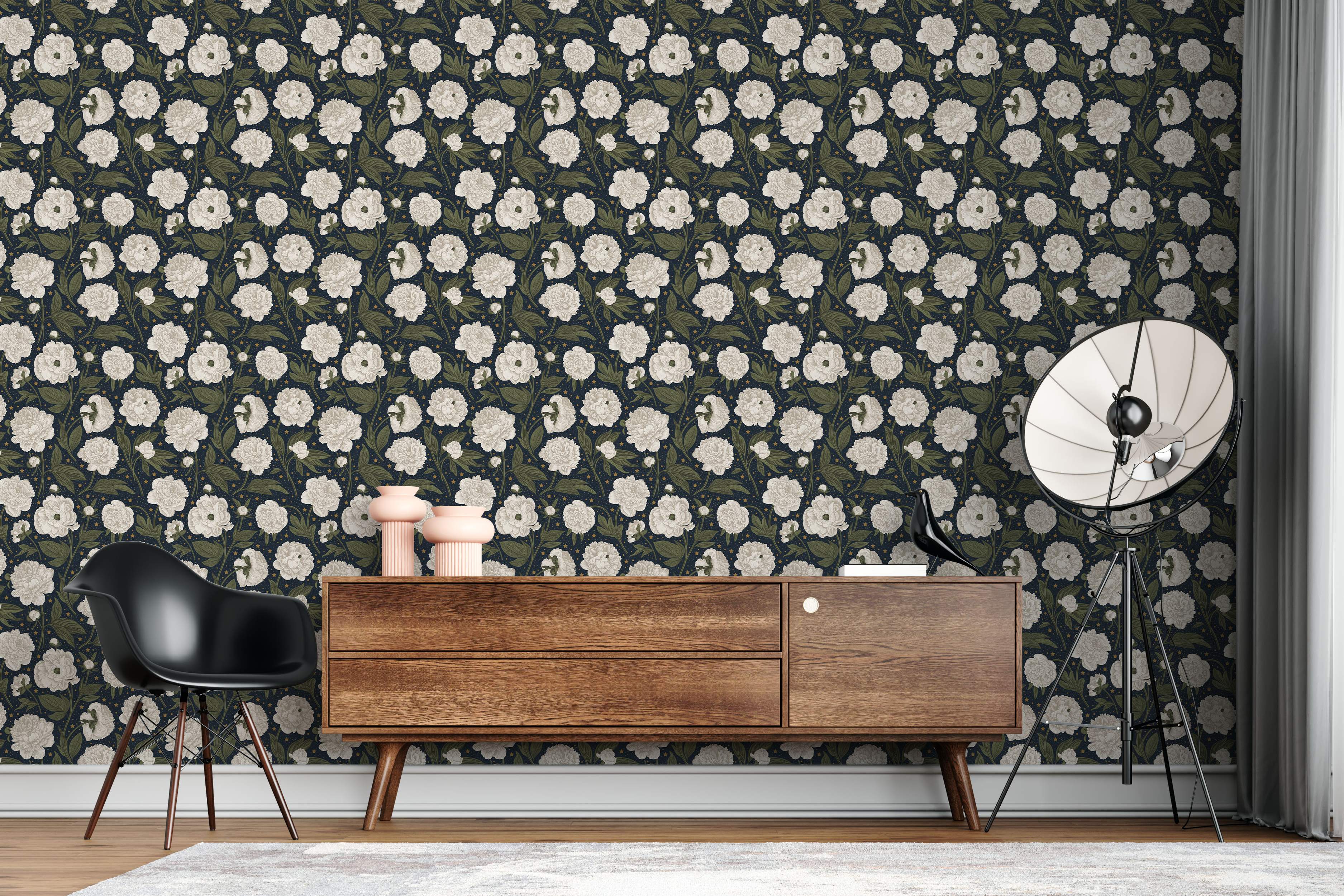 Wallpaper featuring illustrated white peonies and green leaves with small gold stars scattered on a dark navy blue background.