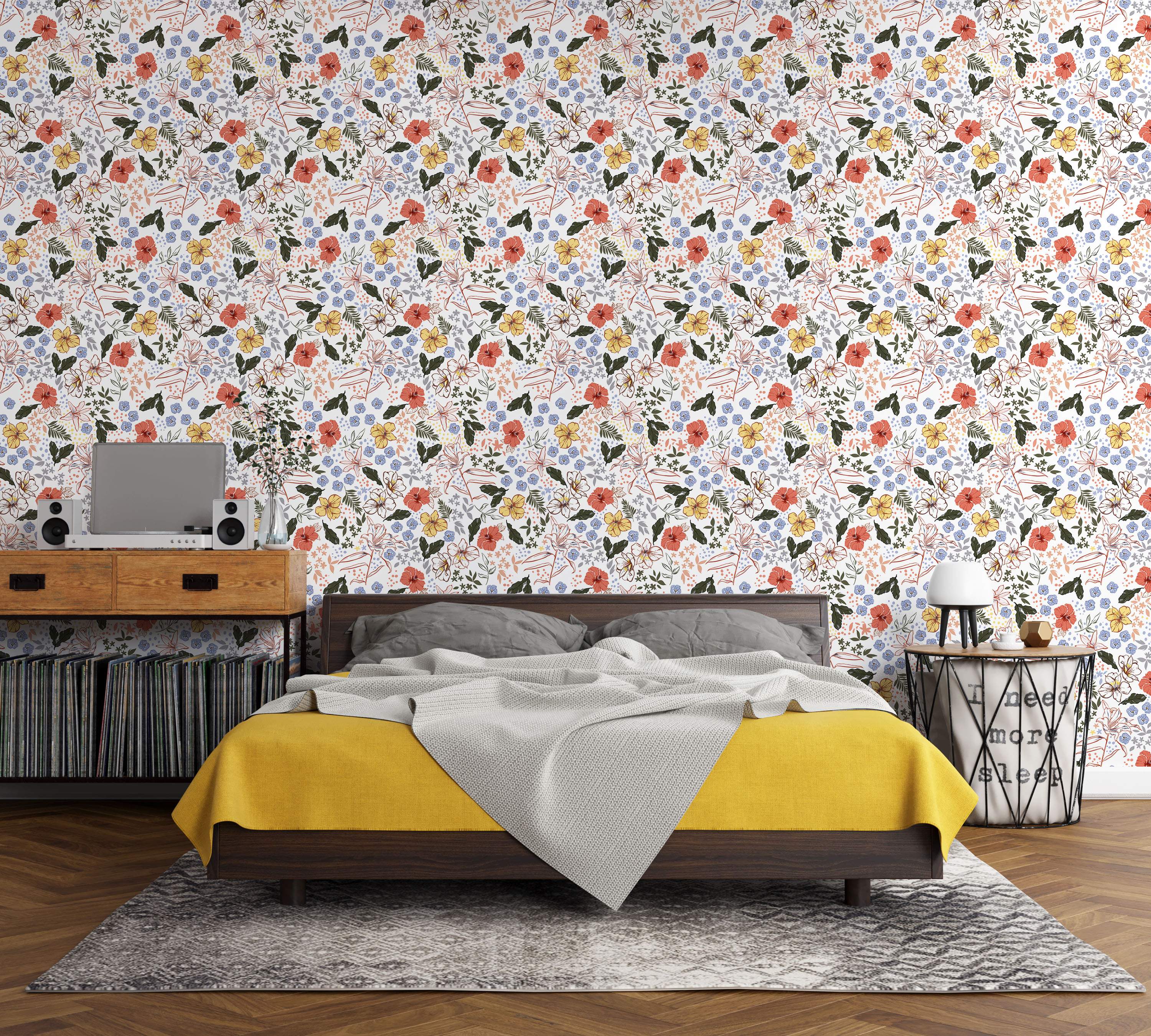 Floral wallpaper with red, yellow, white, and blue flowers, plus green leaves, scattered across a white background.