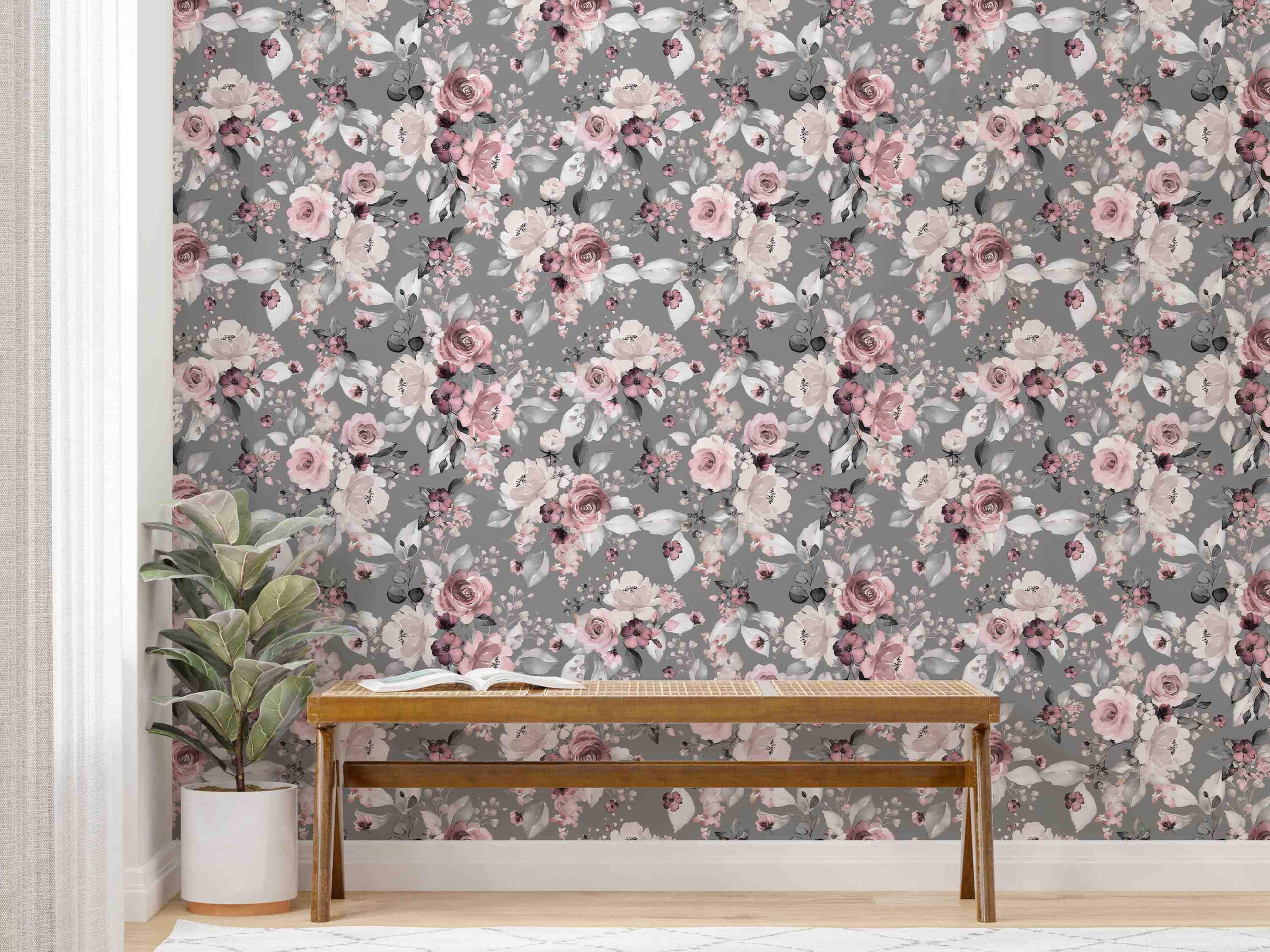 Floral wallpaper with watercolor-style roses and leaves in shades of pink, white, and gray on a solid gray background.