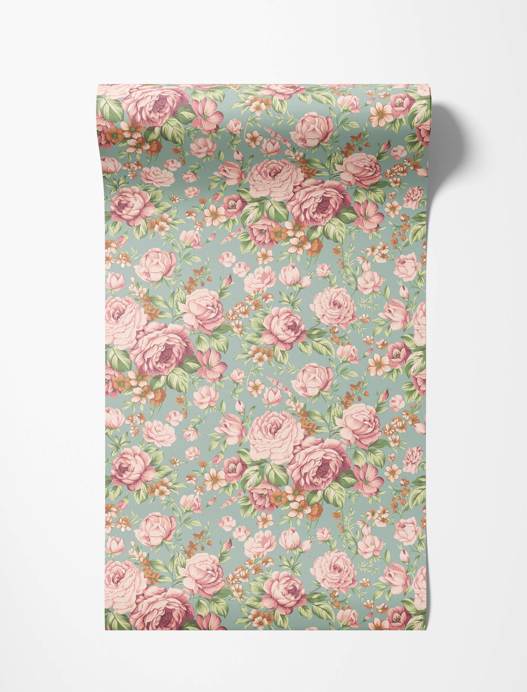 Vintage floral wallpaper featuring pink roses, smaller orange flowers, and green leaves scattered across a soft teal background.