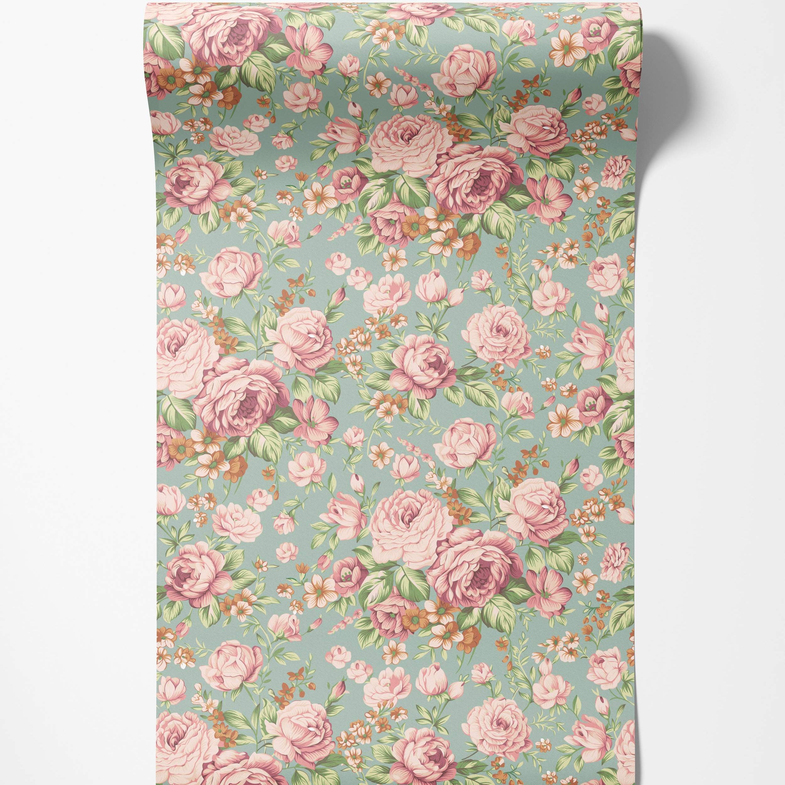 Vintage floral wallpaper featuring pink roses, smaller orange flowers, and green leaves scattered across a soft teal background.