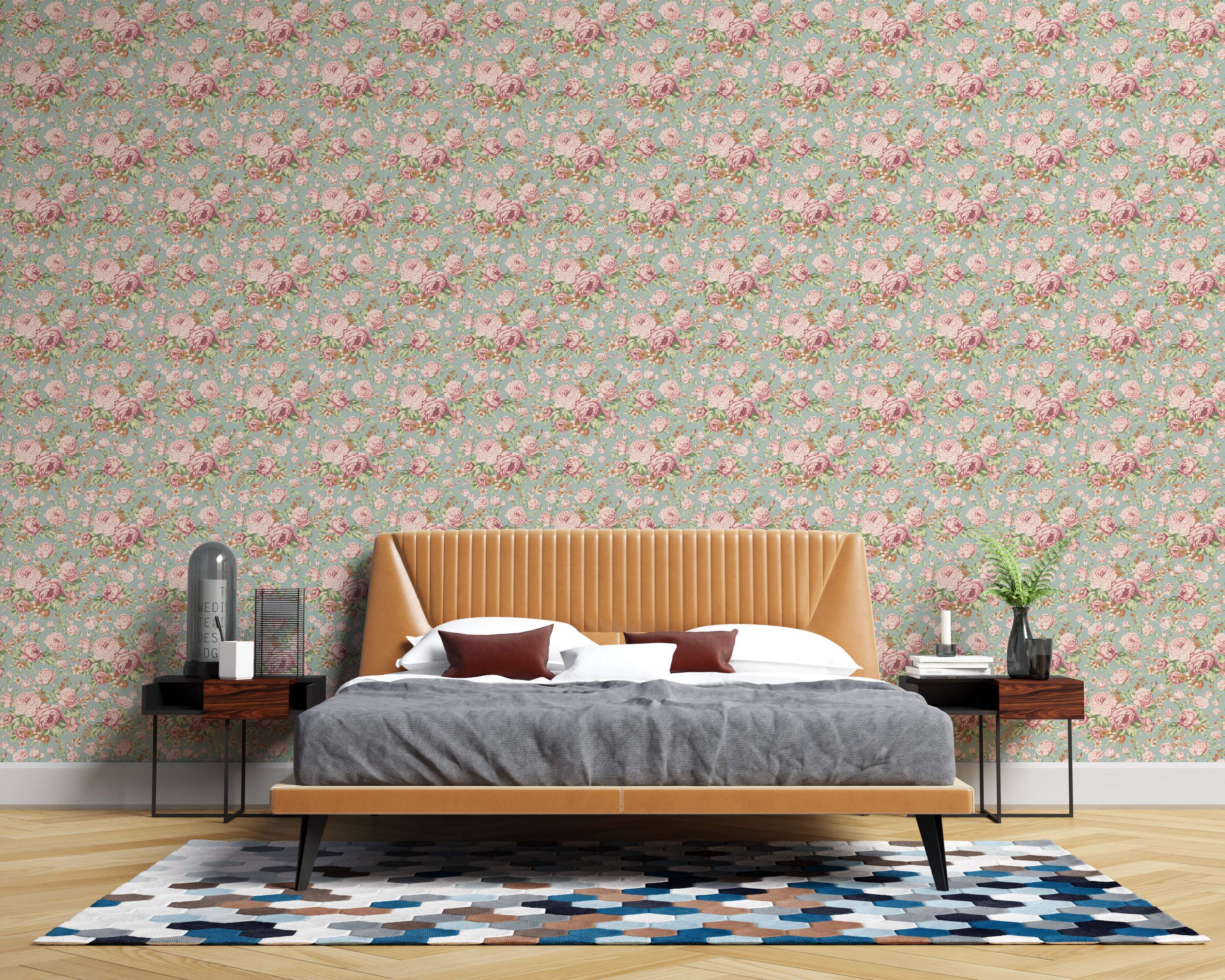 Vintage floral wallpaper with repeating pink roses and green leaves scattered across a pale teal background.