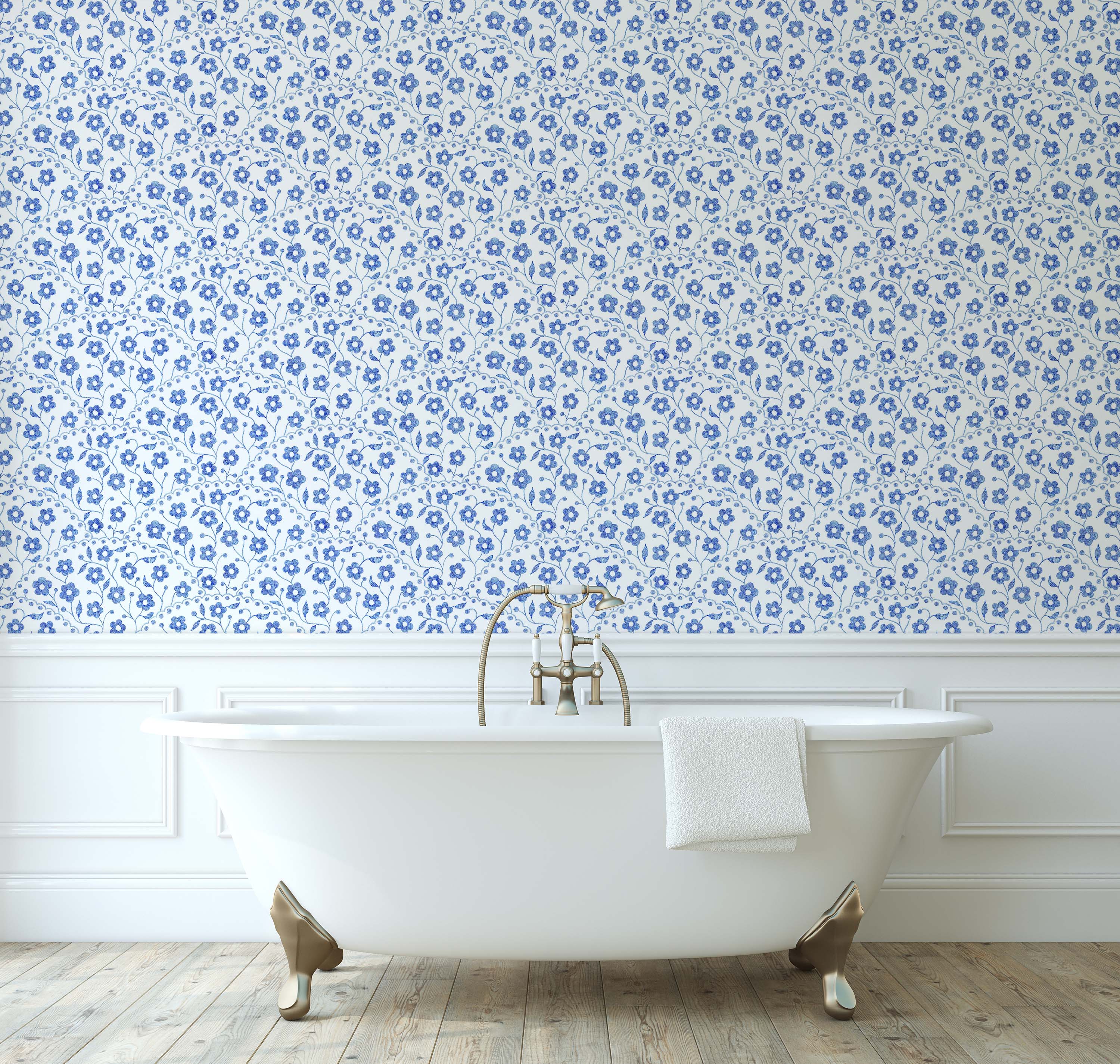 Delicate floral wallpaper with small blue flowers and leaves arranged in a repeating scalloped pattern on a white background.