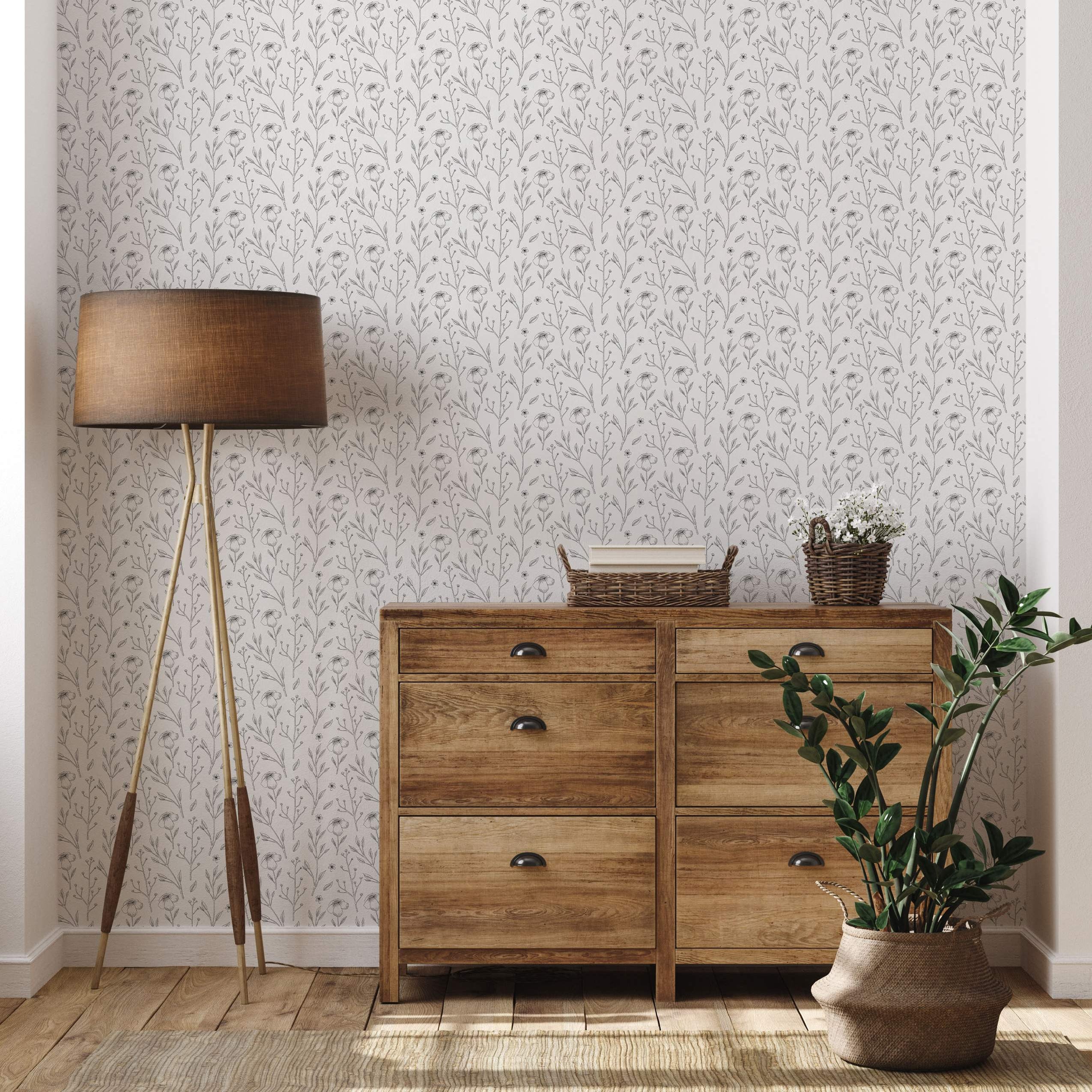 Light gray wallpaper featuring a repeating pattern of delicate, sketched gray botanical stems with flowers and leaves.