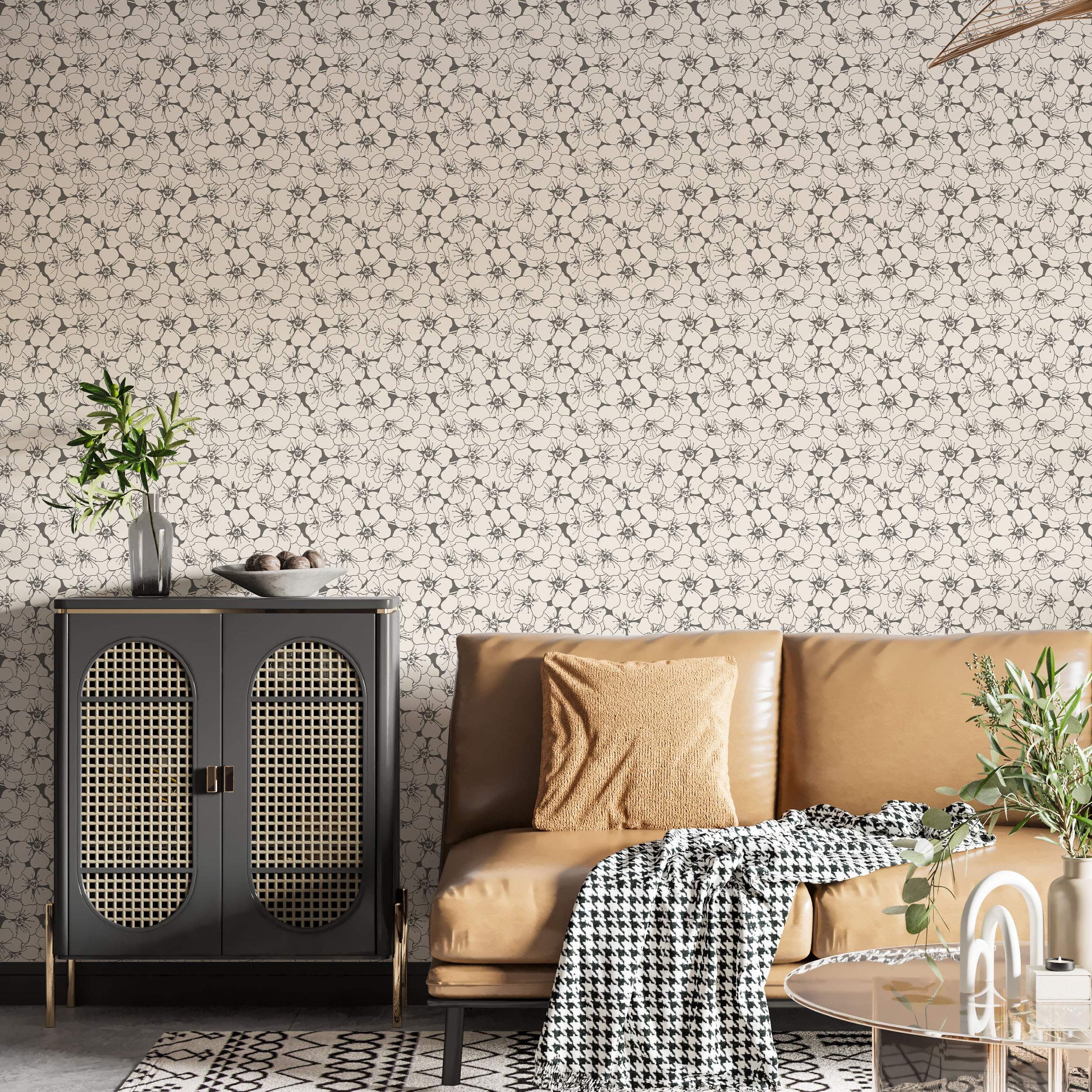 Wallpaper featuring a repeating pattern of sketched floral outlines in dark grey on a light beige background.