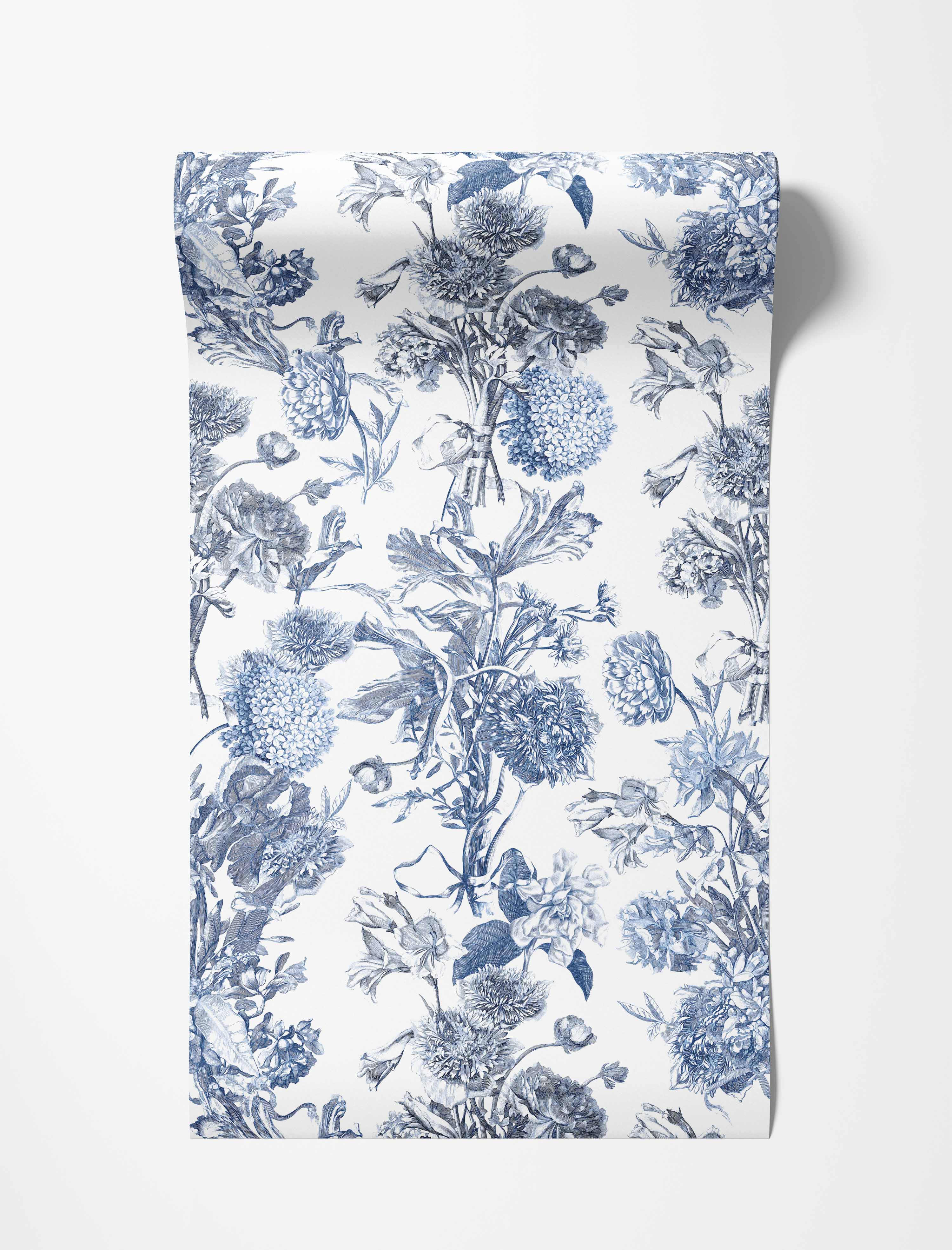 Vintage floral toile wallpaper with detailed blue botanical illustrations of various flowers arranged vertically on a white background.