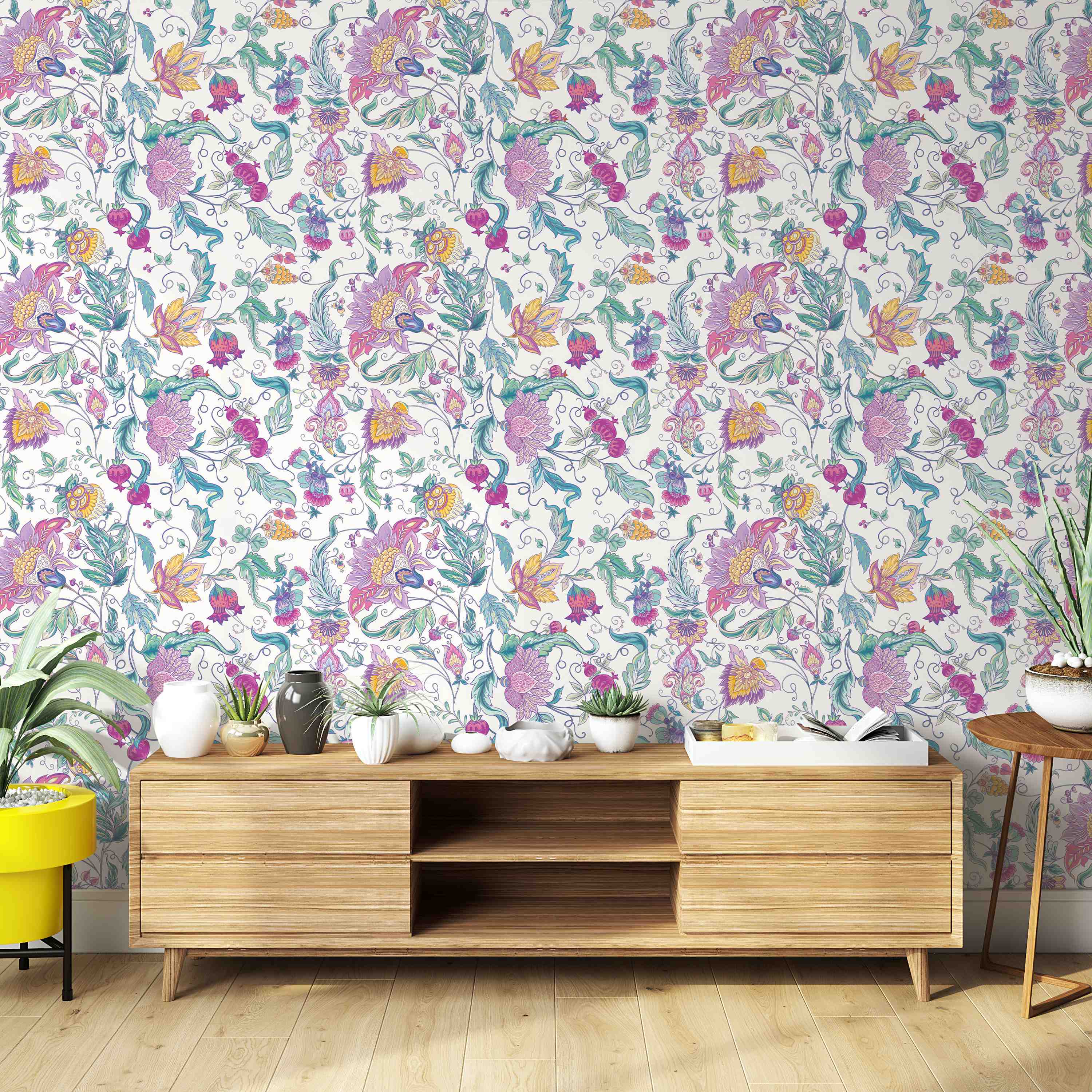 Intricate floral vine wallpaper with pink, purple, yellow, and green stylized flowers and leaves on a light background.