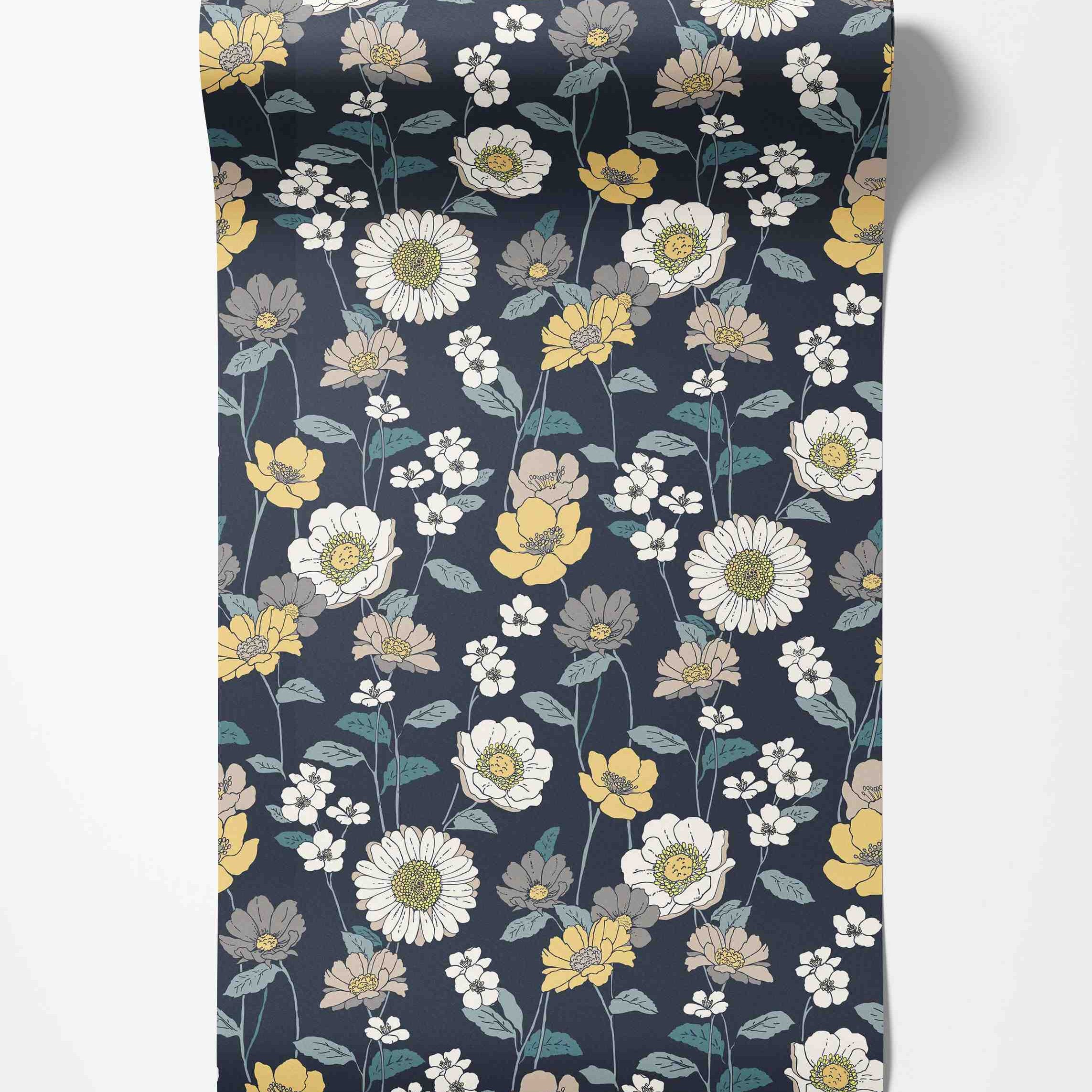 Wallpaper with a repeating floral pattern featuring yellow, white, beige, and grey flowers on a dark blue background.
