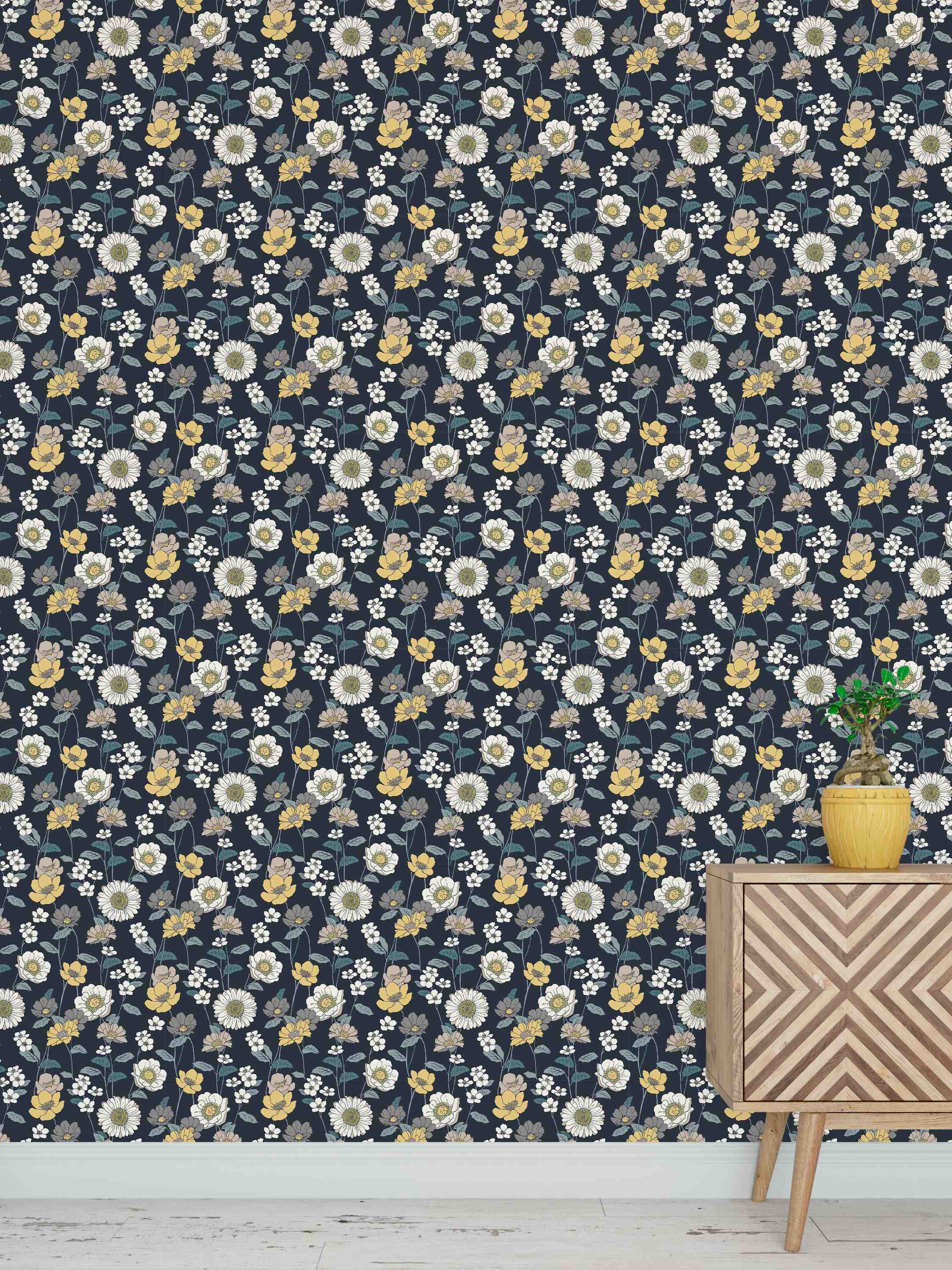 Floral wallpaper with white, yellow, and gray flowers and green stems on a dark navy blue background.