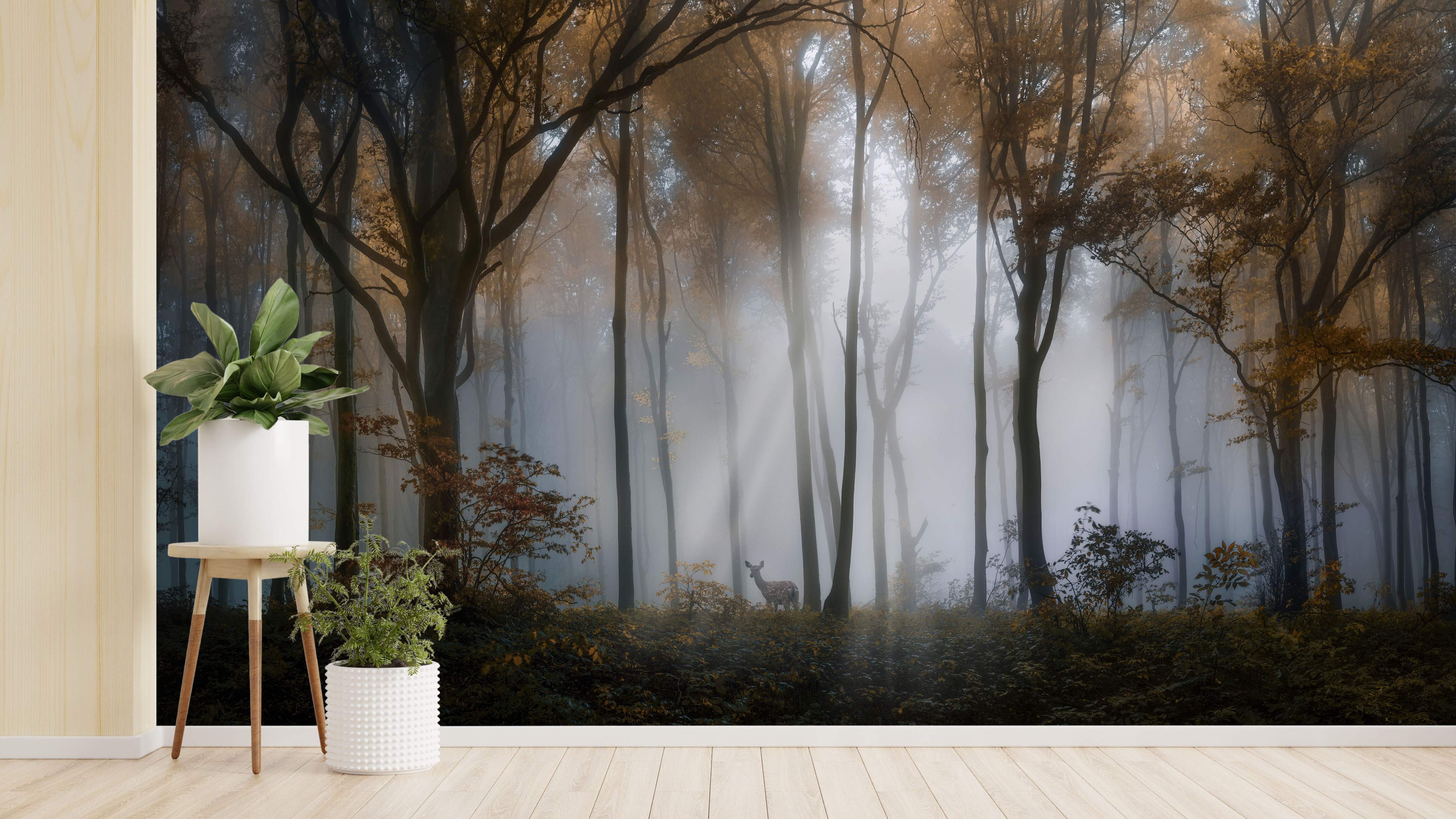 Photorealistic mural depicting a foggy autumn forest with golden-brown trees, light rays filtering through, and a small deer.