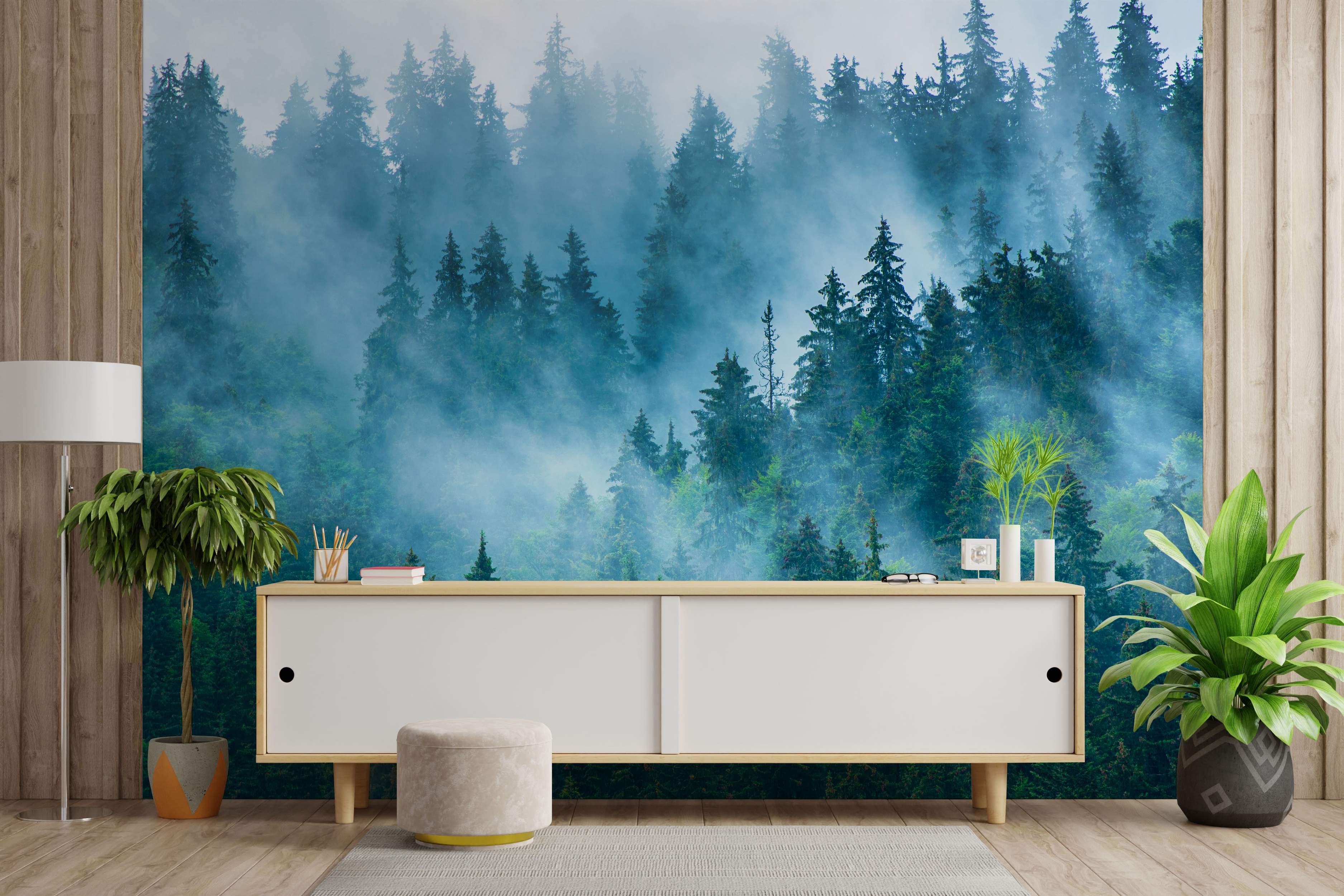 Mural featuring tall green pine trees fading into a dense, atmospheric blue-white fog, creating a misty forest scene.
