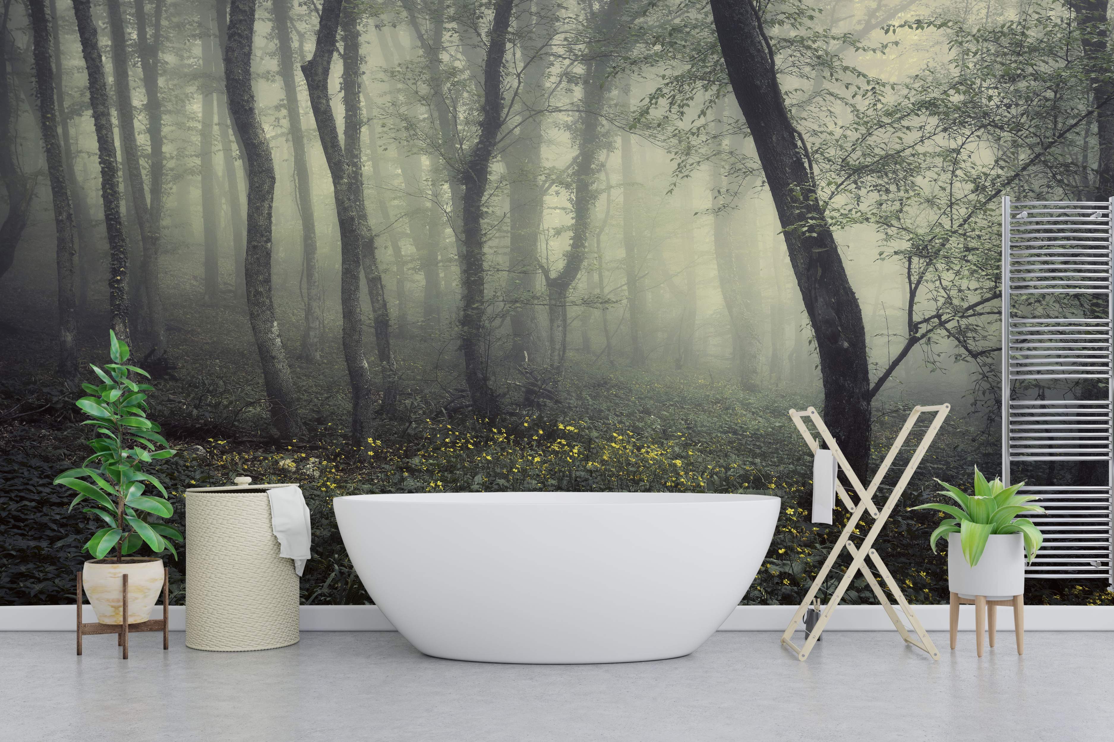 Photographic mural depicting a misty forest scene with tall gray tree trunks, green foliage, yellow flowers, and dense fog.