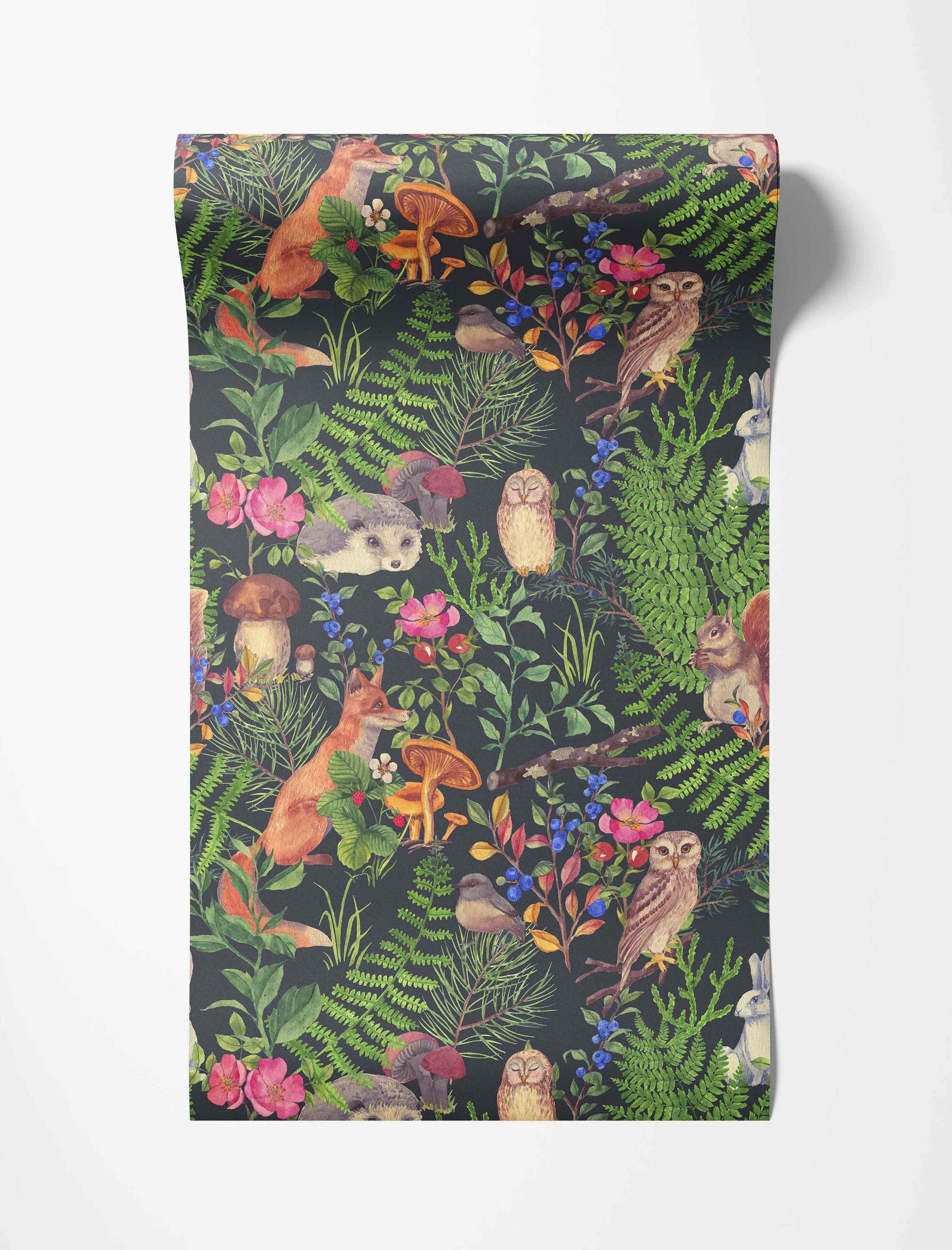Illustrated woodland wallpaper featuring foxes, owls, squirrels, hedgehogs, and plants in greens, browns, and pinks on dark gray.