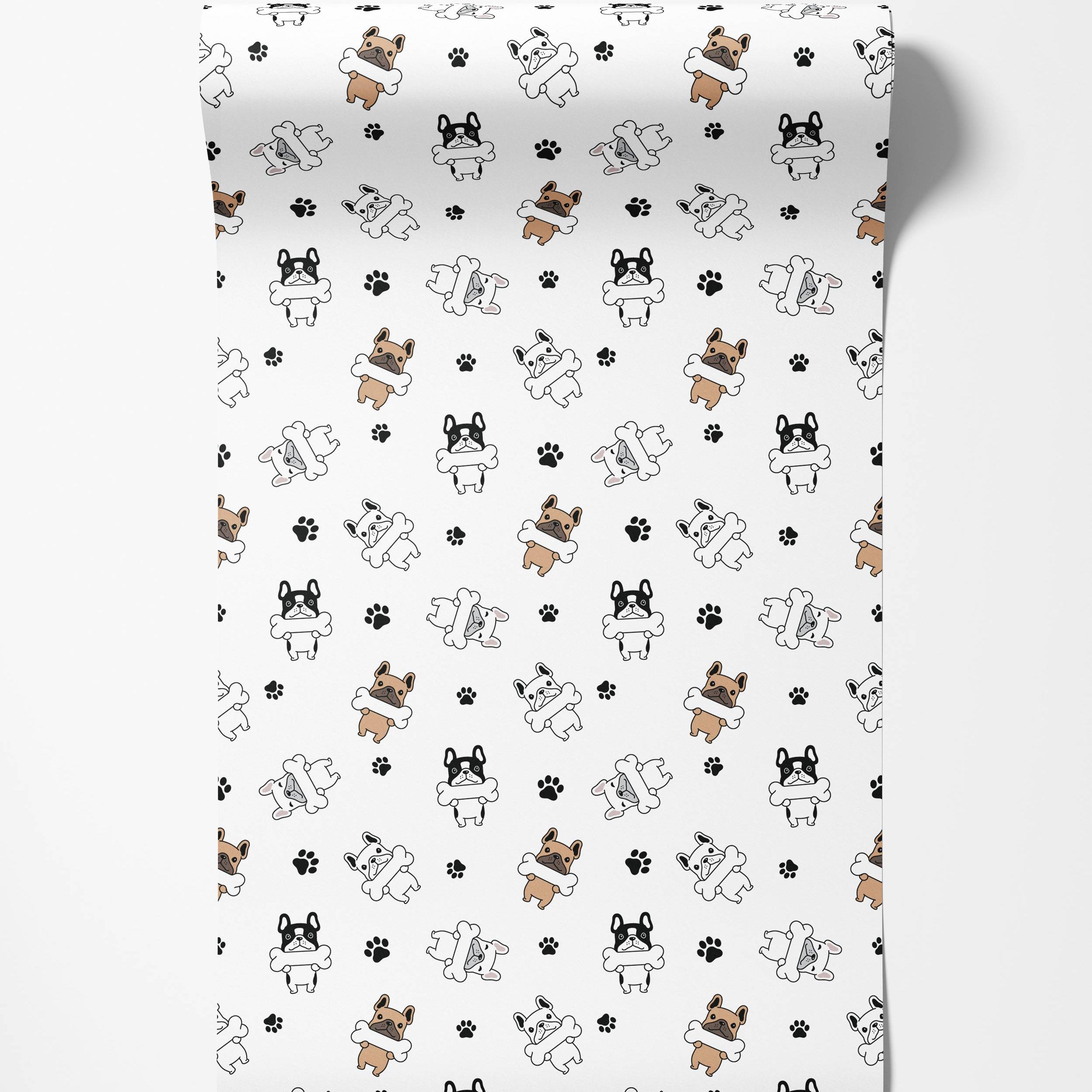 A playful wallpaper featuring cartoon French bulldogs in brown, black, and white holding bones, with black paw prints on a white field.