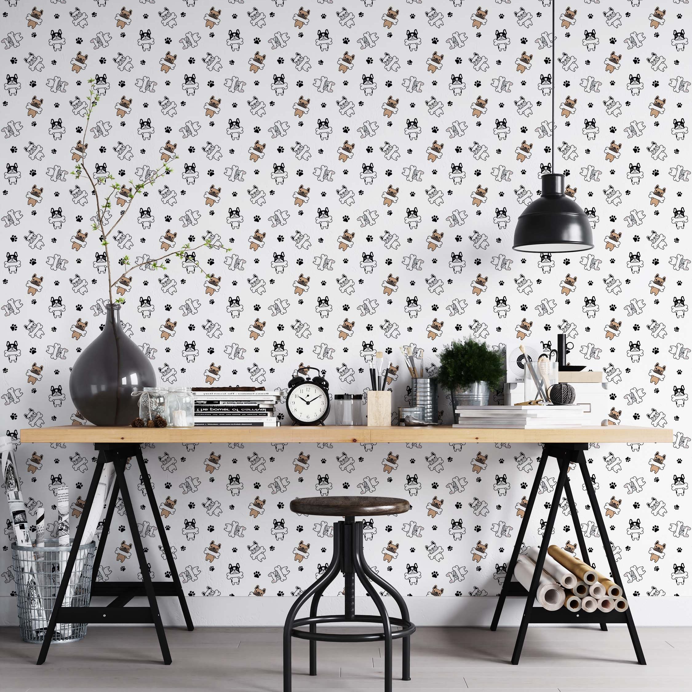 A playful wallpaper featuring a pattern of cartoon French bulldogs in black, white, and tan, with black paw prints.