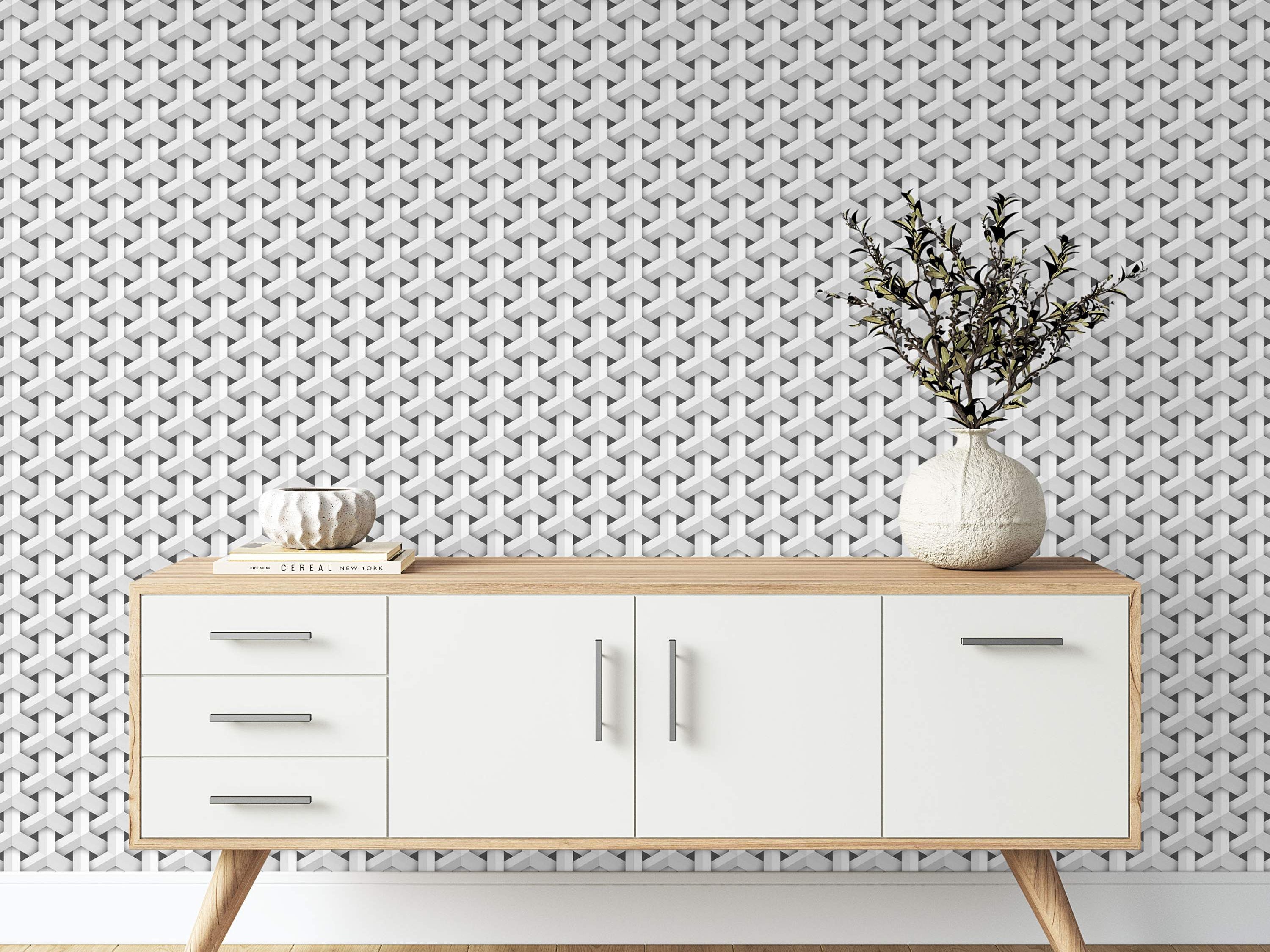 Wallpaper features a repeating geometric pattern of interlocking white and gray 3D Y-shapes, creating a woven optical illusion.
