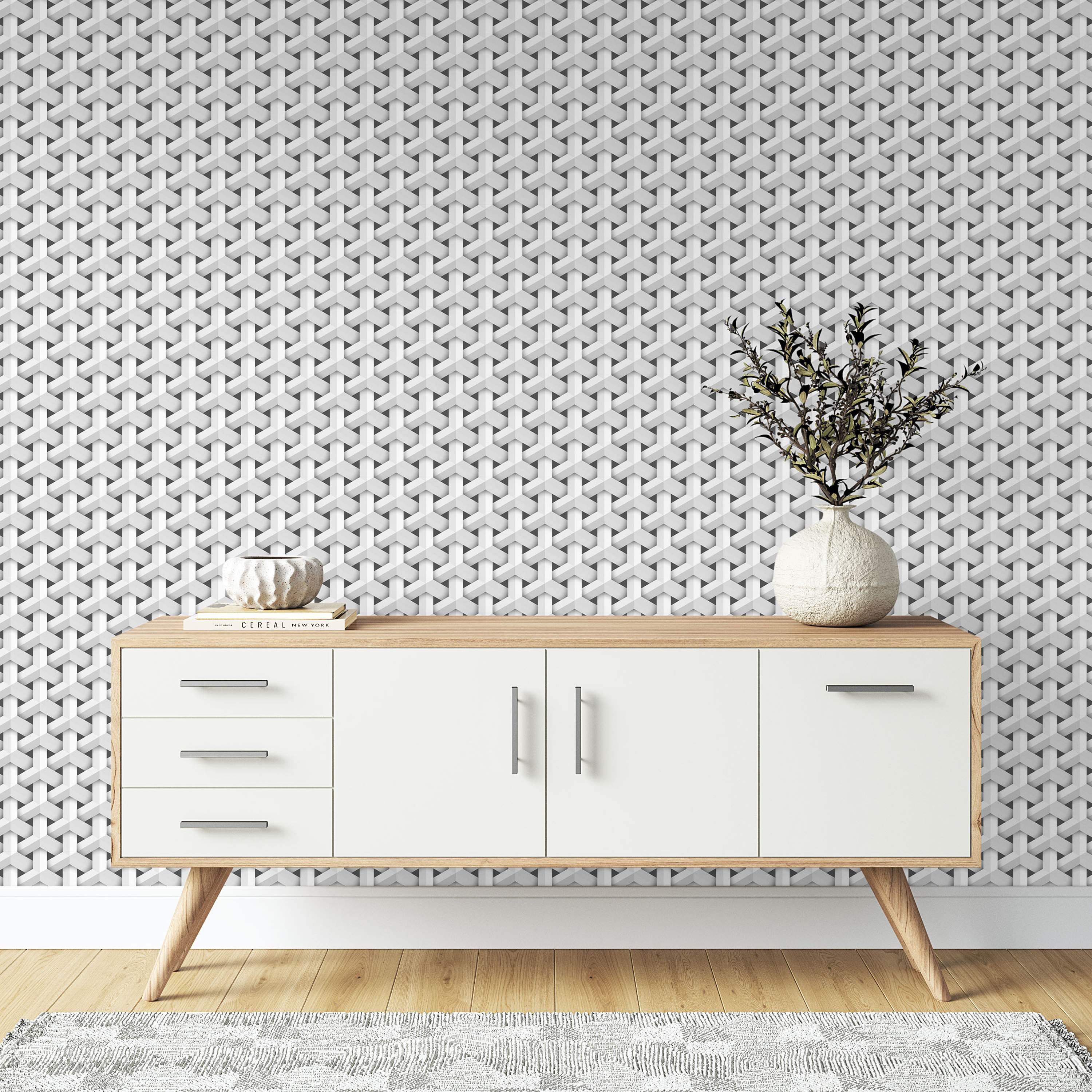 Wallpaper features a repeating geometric pattern of interlocking white and gray 3D Y-shapes, creating a woven optical illusion.