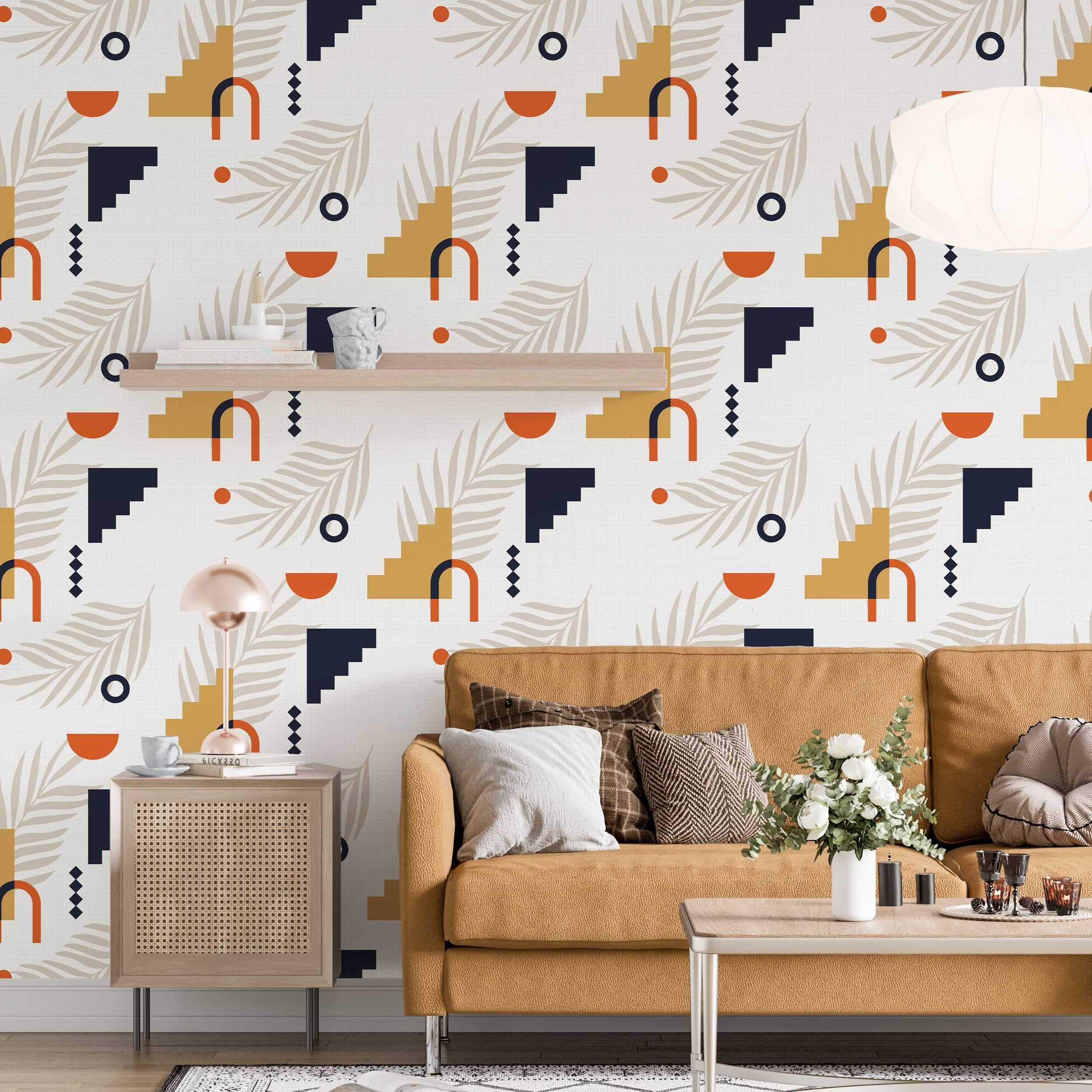 Abstract geometric wallpaper with orange arches, blue/yellow steps, beige leaves, and dots on a light background.