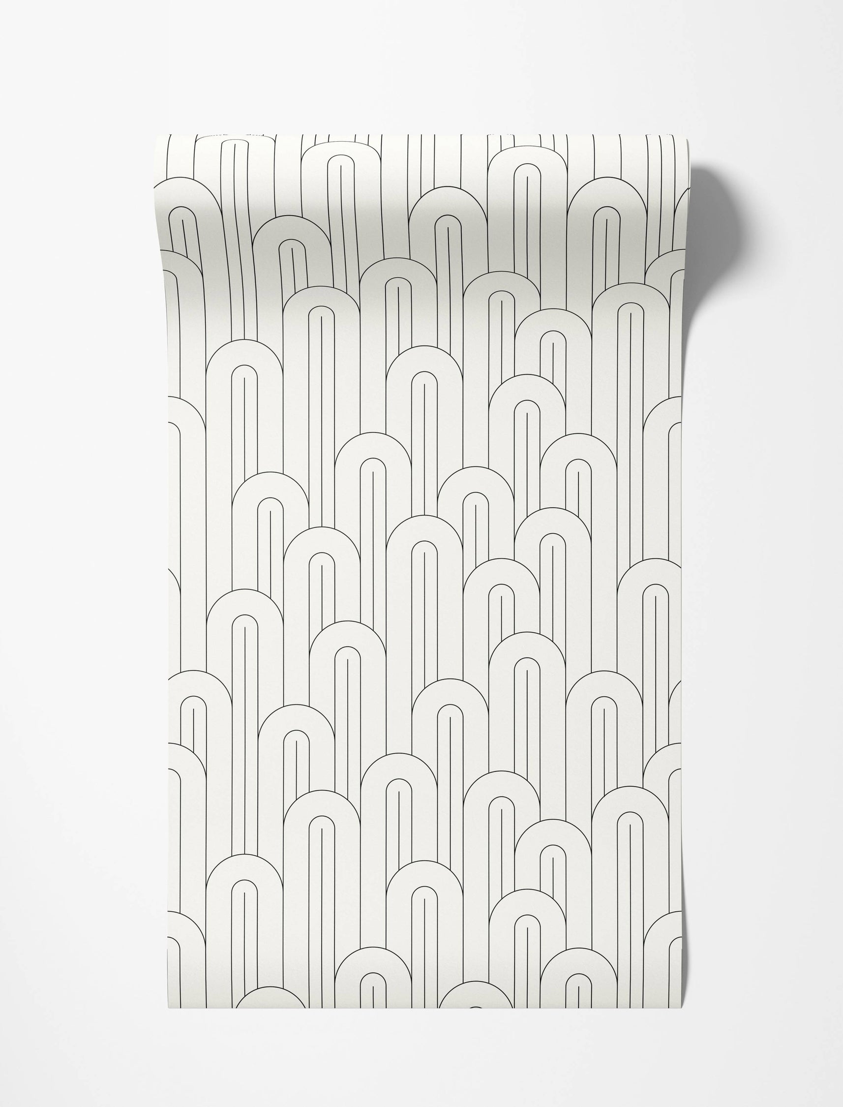 Geometric wallpaper with a repeating pattern of thin black line arches stacked on an off-white field.