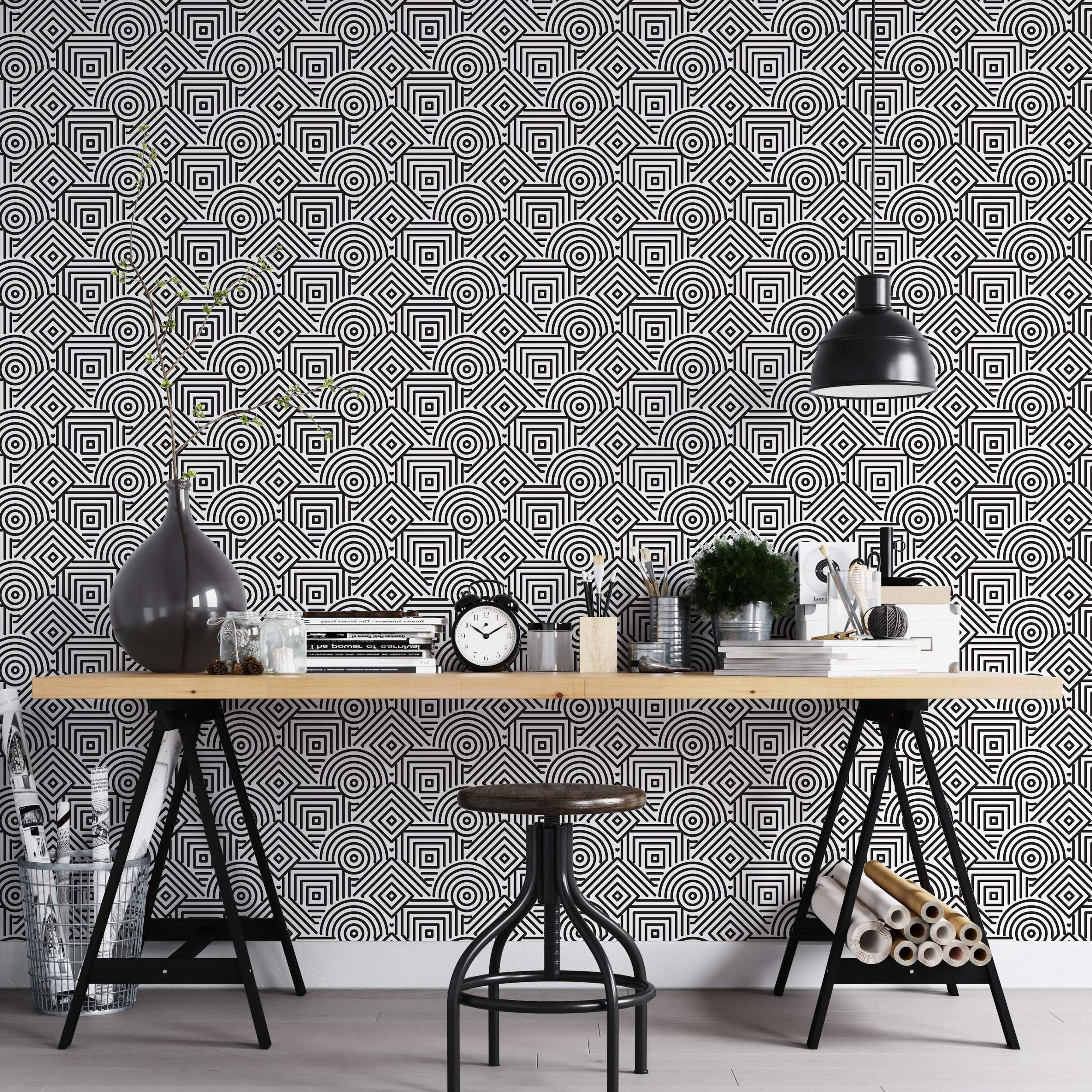 Black and white geometric wallpaper featuring complex line patterns of concentric squares, circles, and quarter-circle arches.