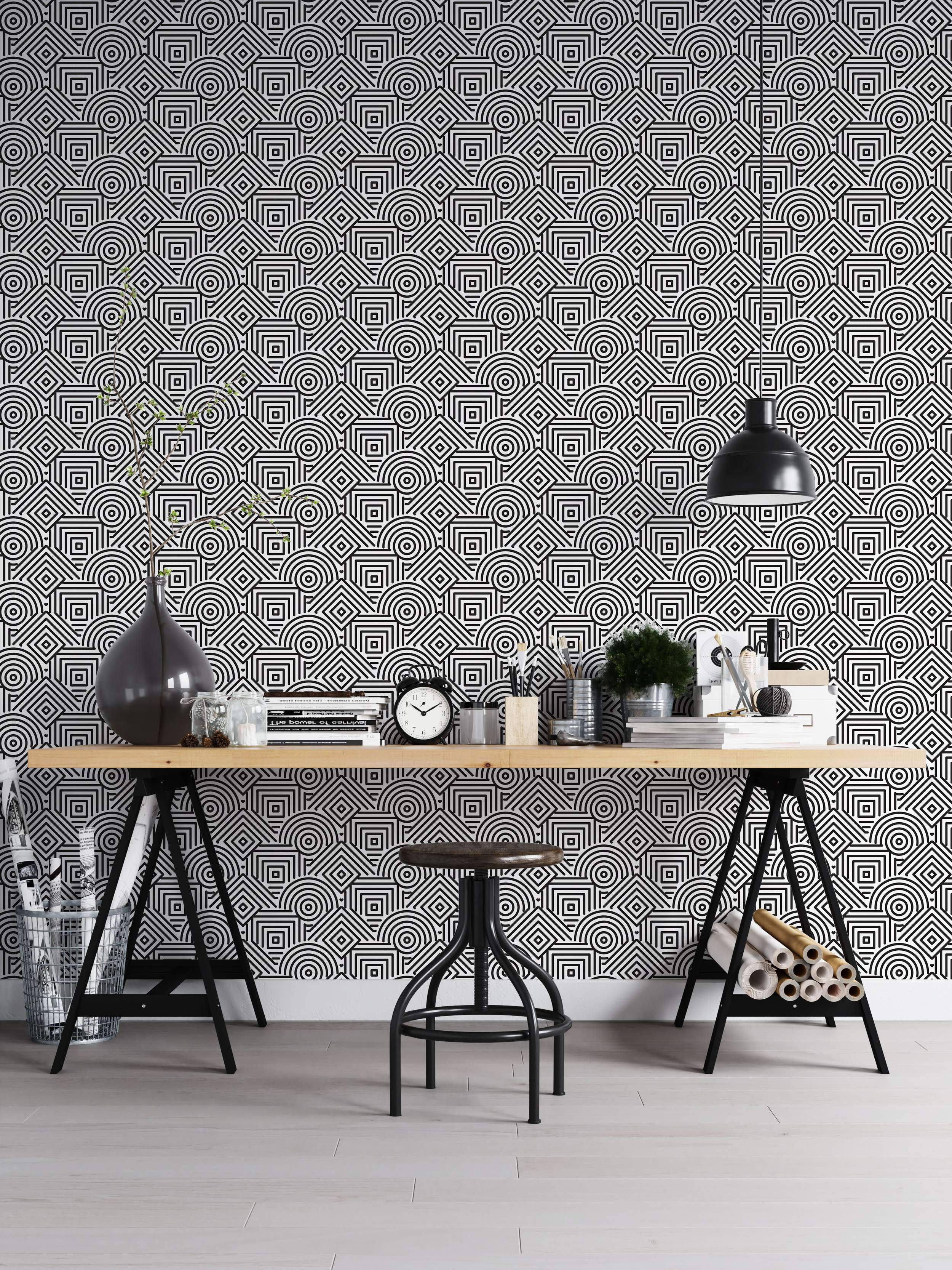 Black and white geometric wallpaper featuring complex line patterns of concentric squares, circles, and quarter-circle arches.