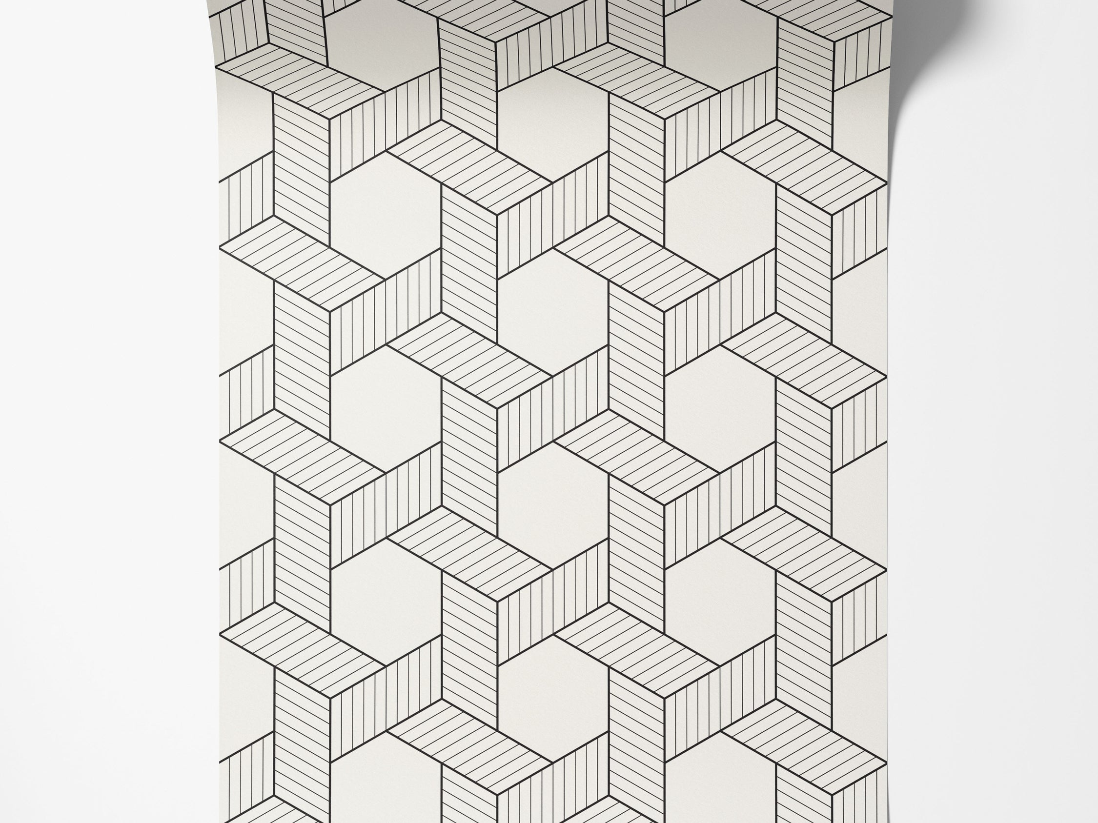 Geometric wallpaper with interlocking black line blocks, some with linear shading, on an off-white field.