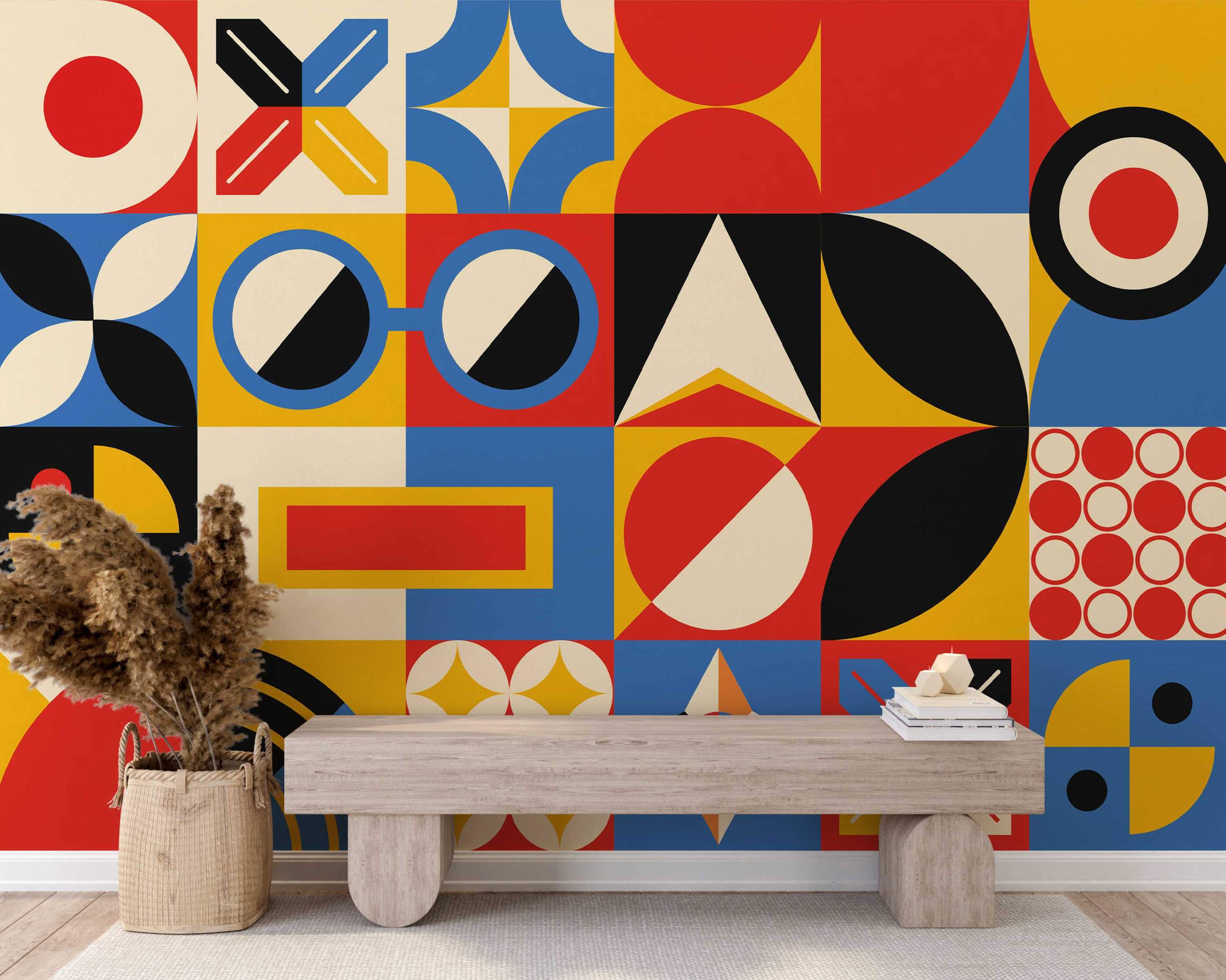 Wallpaper featuring large geometric blocks with bold red, blue, yellow, black, and cream shapes like circles and triangles.