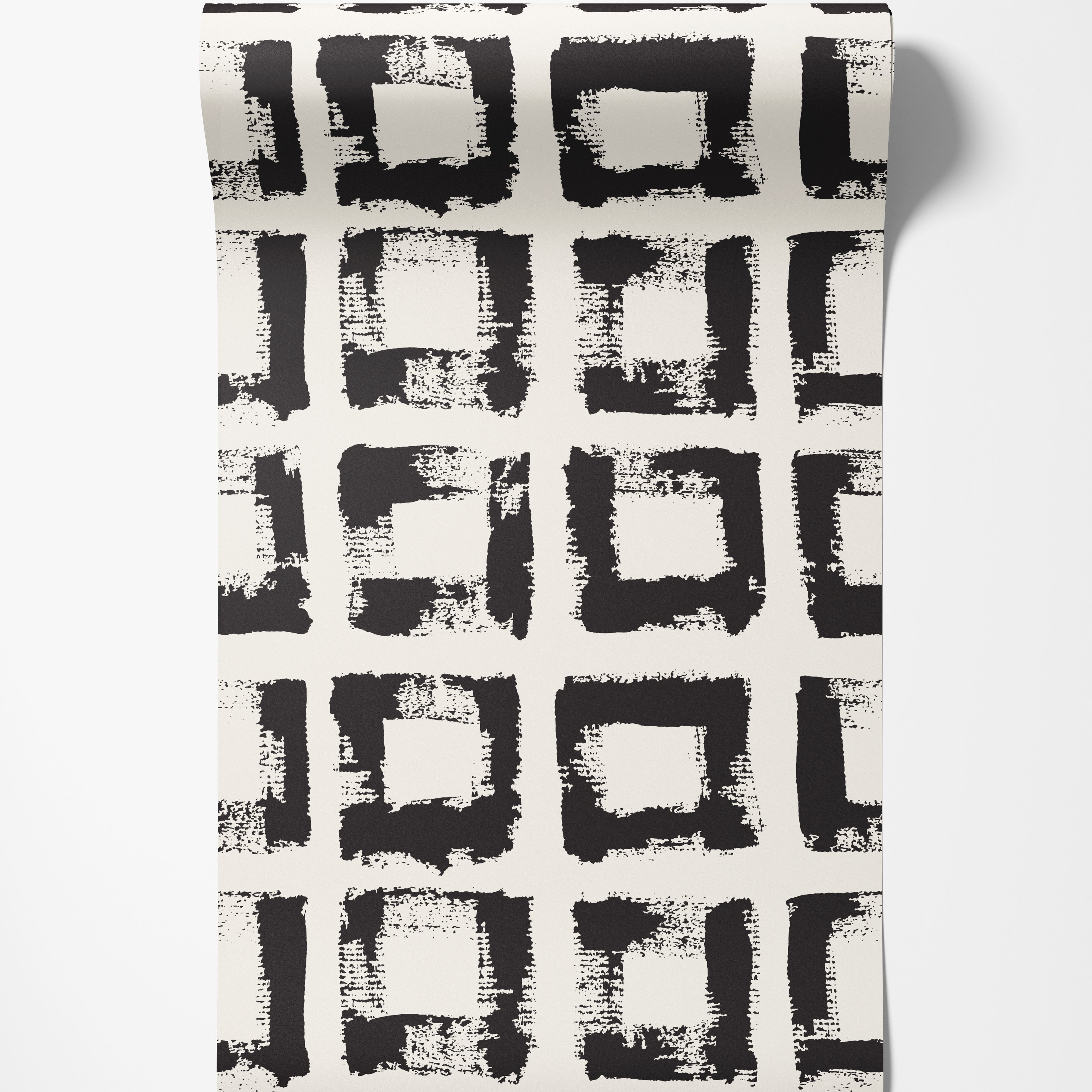 Wallpaper features a grid pattern of hand-painted black squares with rough brushstroke texture on an off-white background.