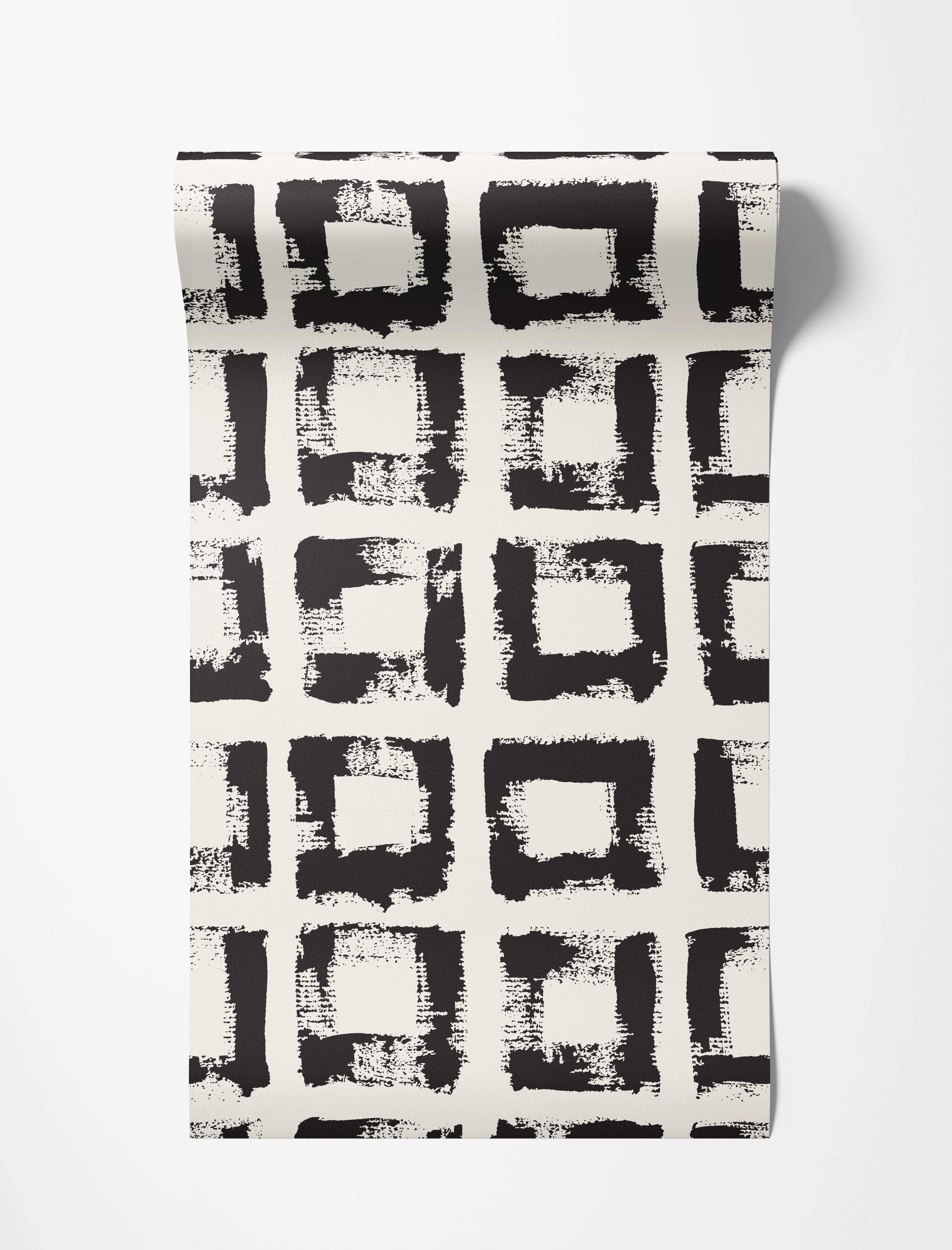 Wallpaper features a grid pattern of hand-painted black squares with rough brushstroke texture on an off-white background.