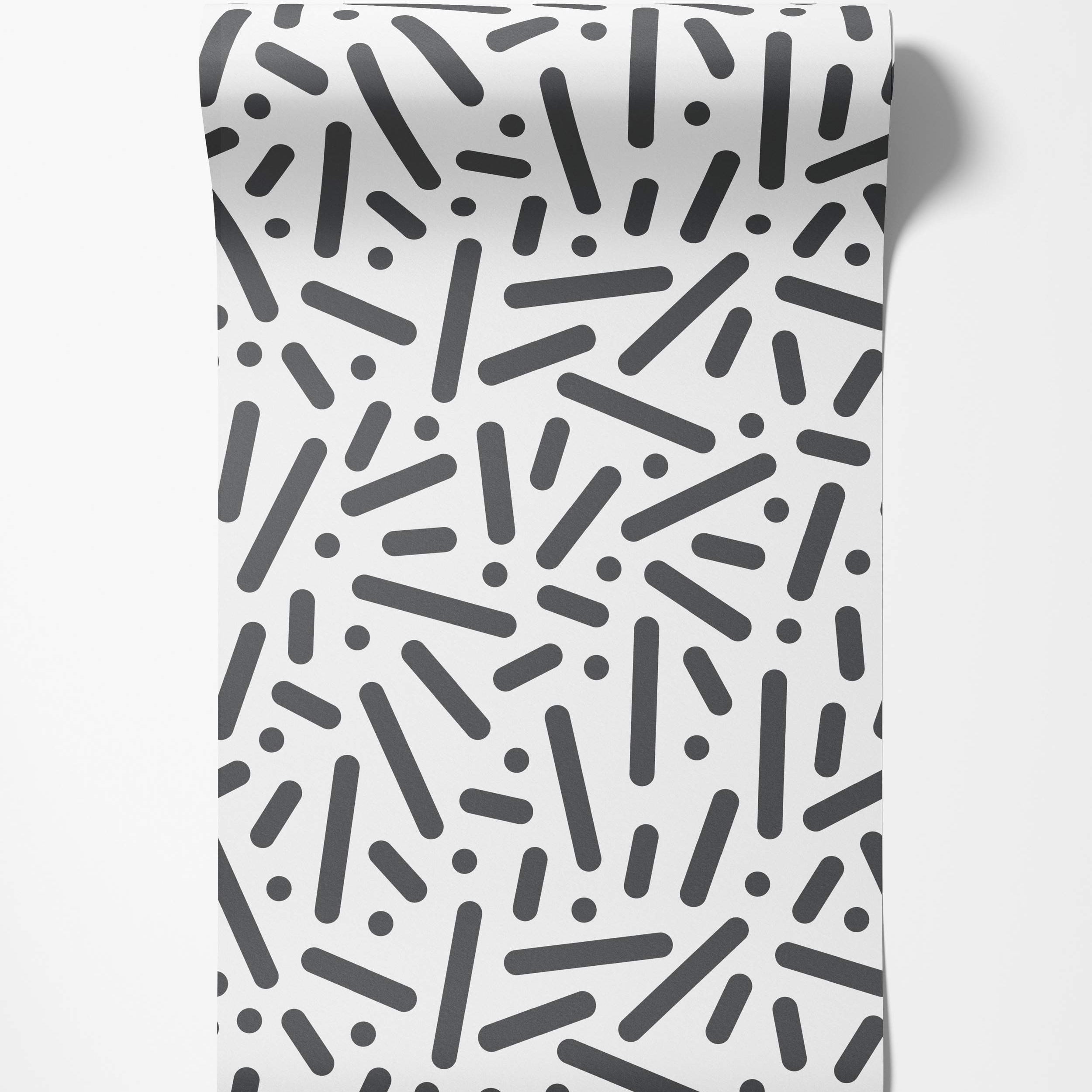 Wallpaper featuring a scattered pattern of black rounded rectangles and dots on a white background.