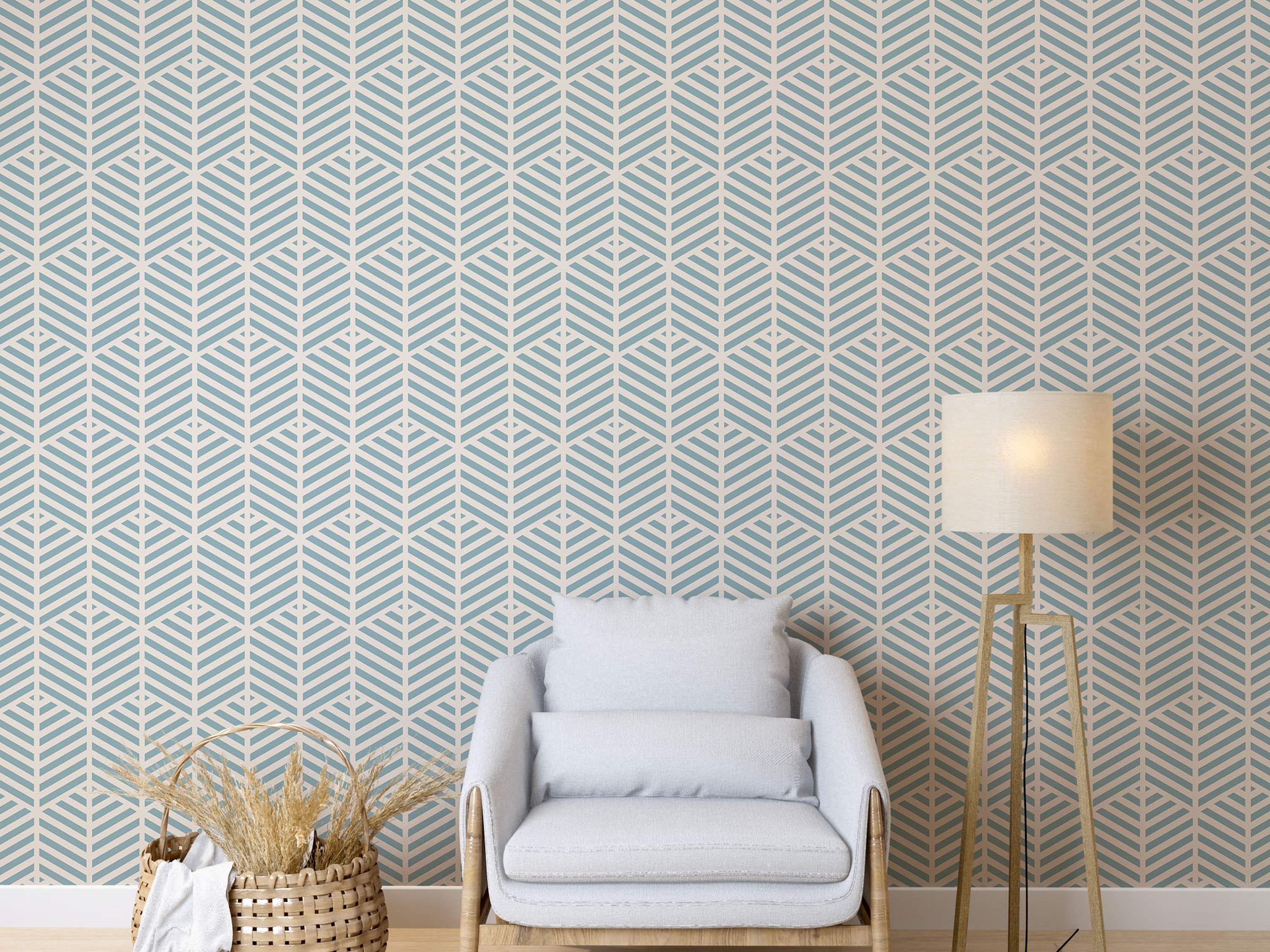 Geometric wallpaper featuring repeating stylized chevron leaf patterns in light blue on a pale beige background.