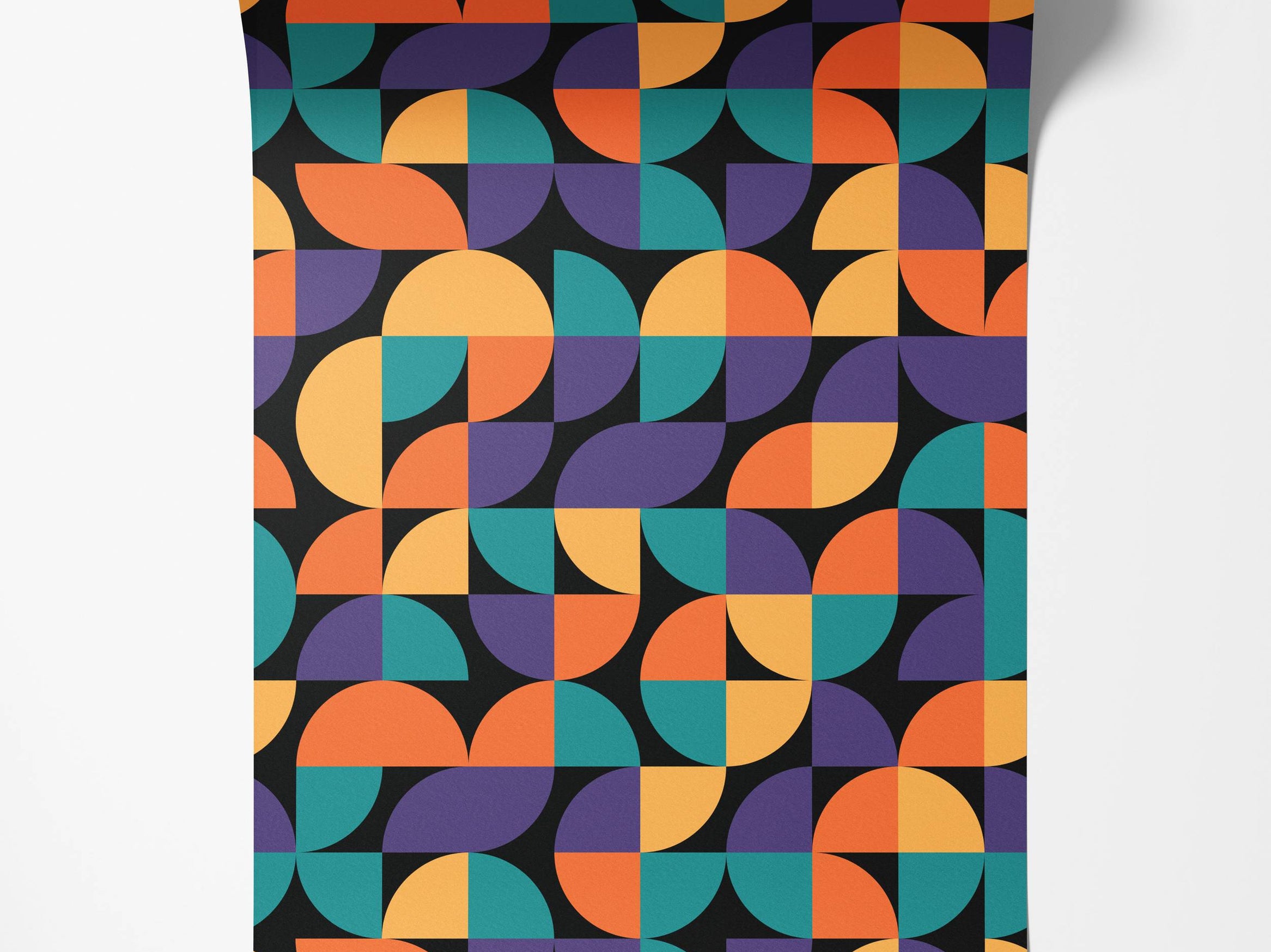 Abstract wallpaper featuring a grid of colorful quarter-circles in orange, teal, and purple against a black background.