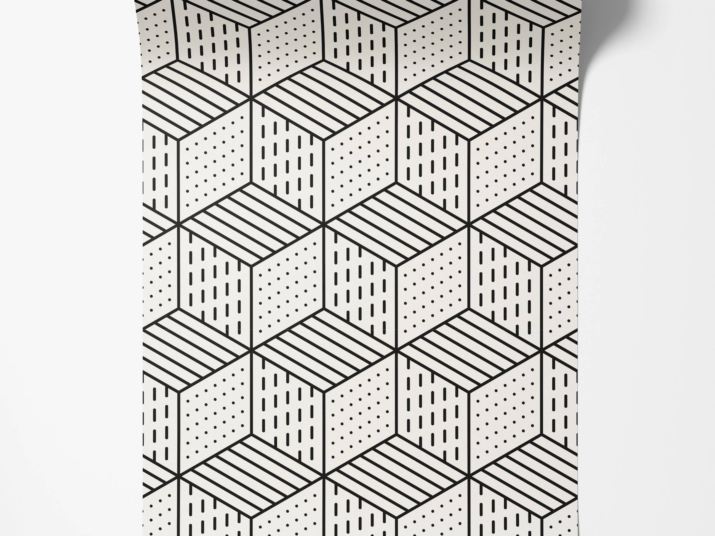 Geometric wallpaper with black isometric cubes on off-white. Faces feature dots, horizontal lines, and vertical dashes.