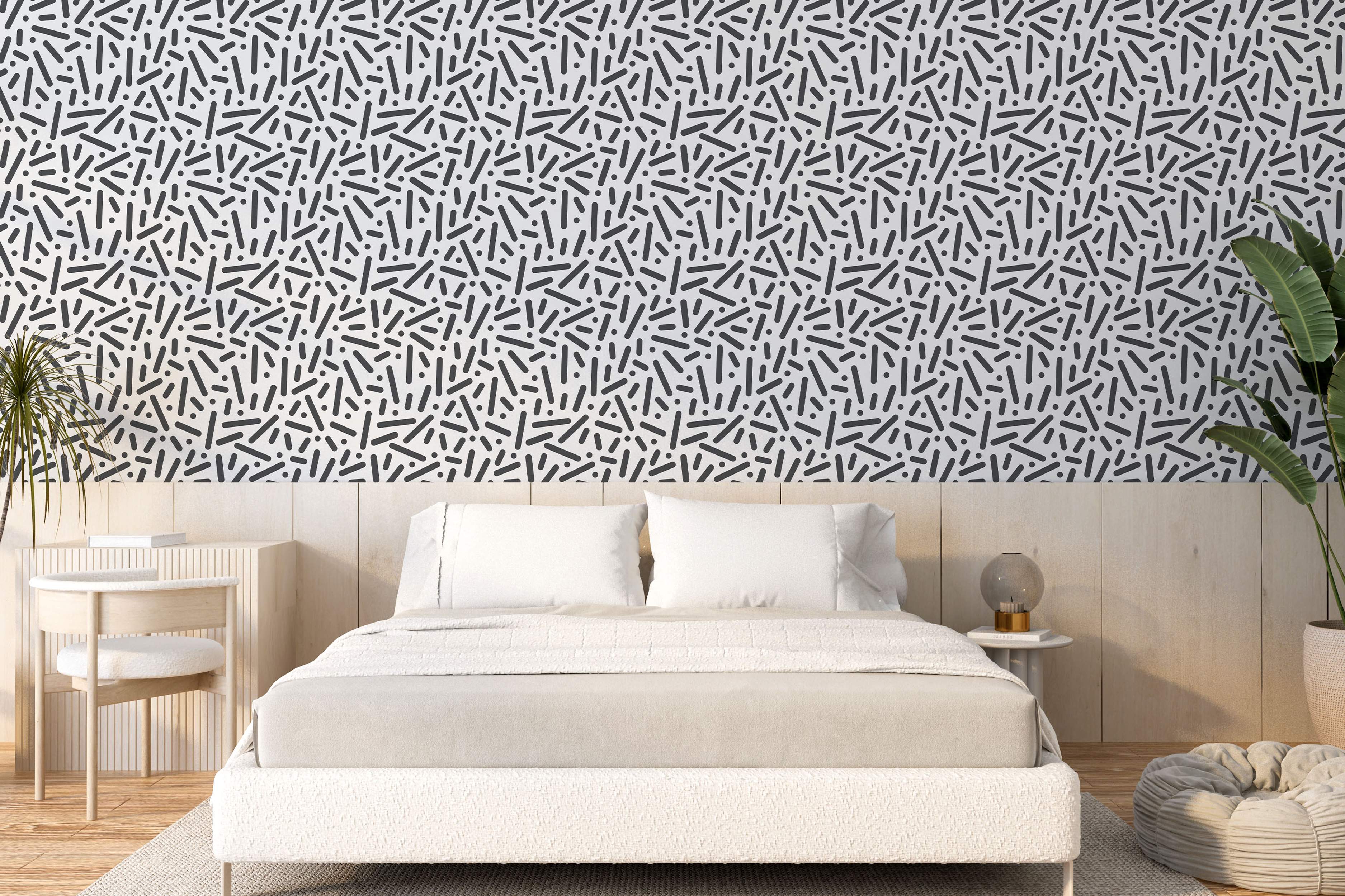 Abstract wallpaper featuring scattered black dashes and dots against a white background.