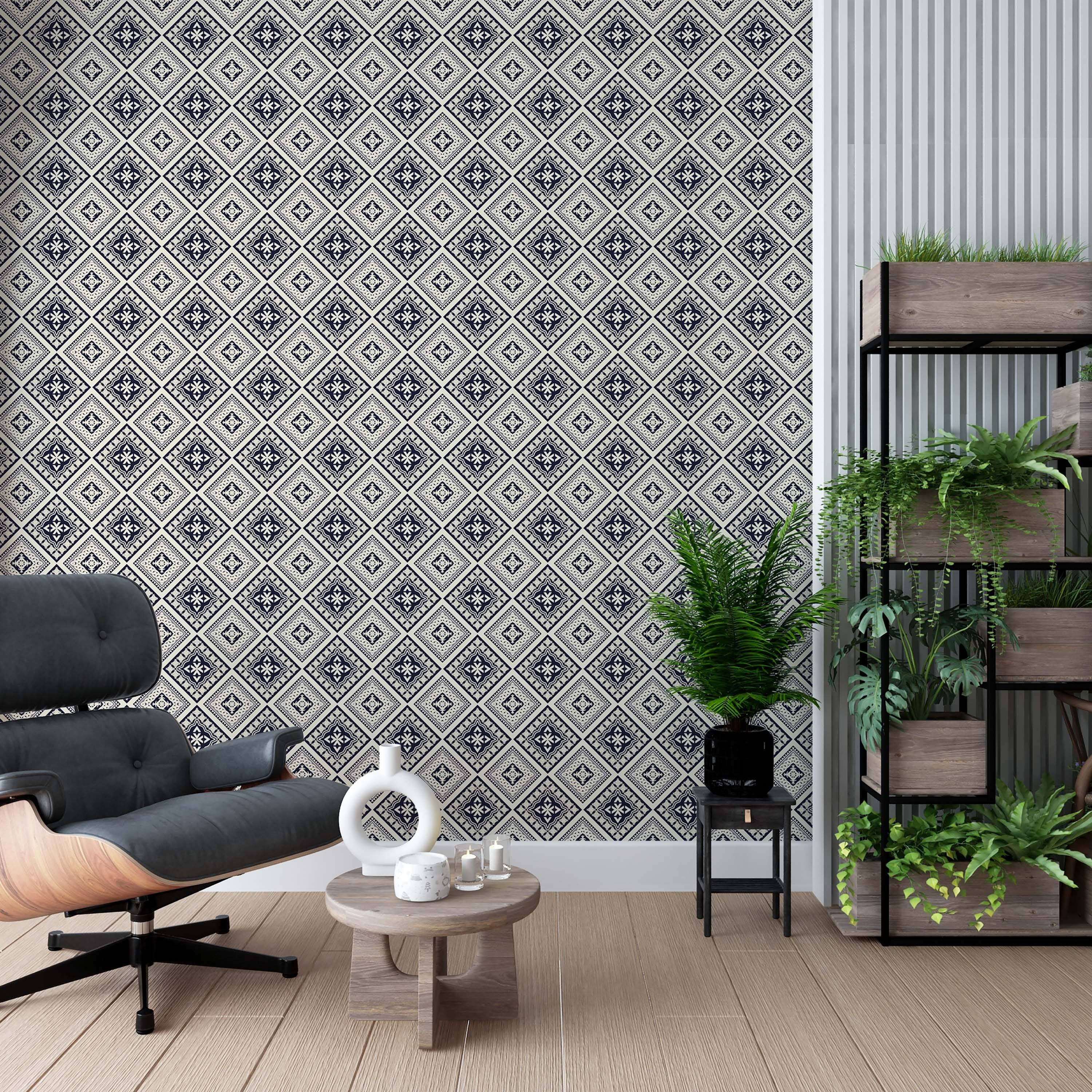 Geometric wallpaper featuring alternating navy blue and off-white diamond tiles with intricate central motifs.