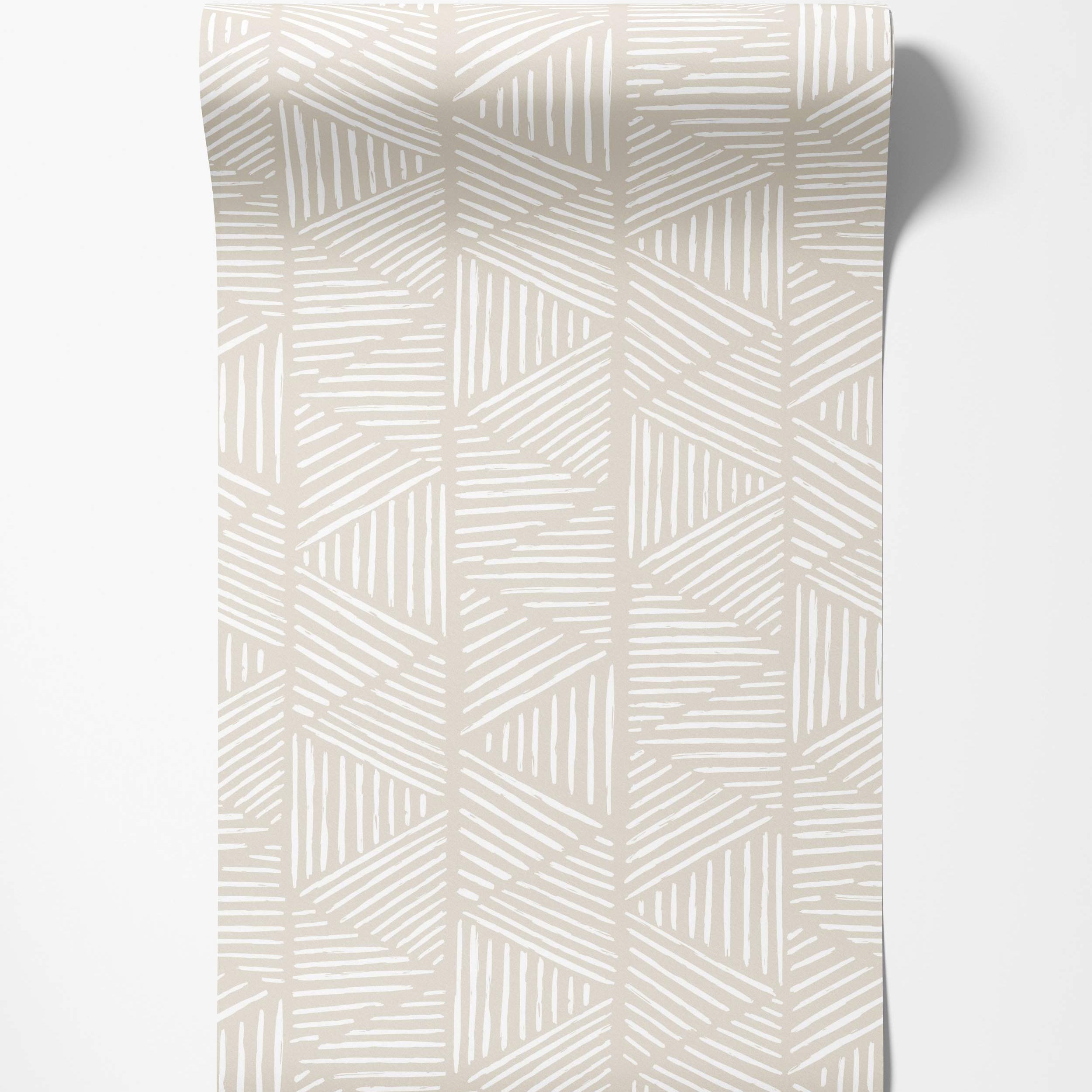 Beige wallpaper featuring a geometric pattern of white sketched lines forming interlocking shapes.