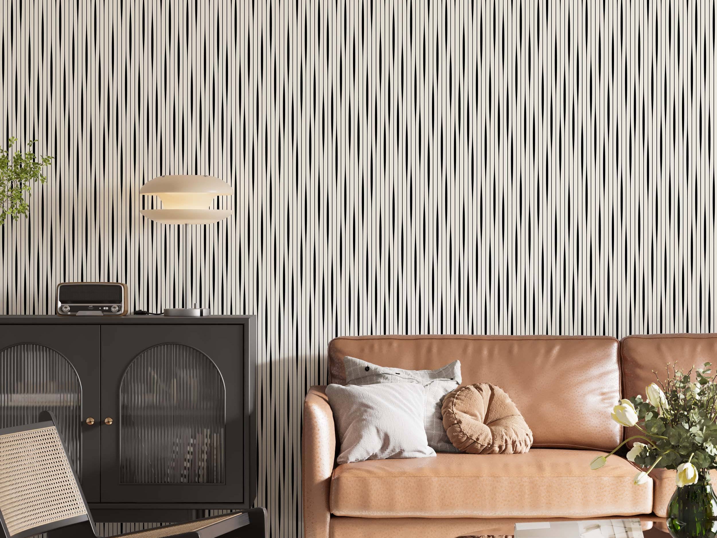 Geometric wallpaper featuring thin black vertical lines alternating with thicker, undulating cream lines on a cream background.