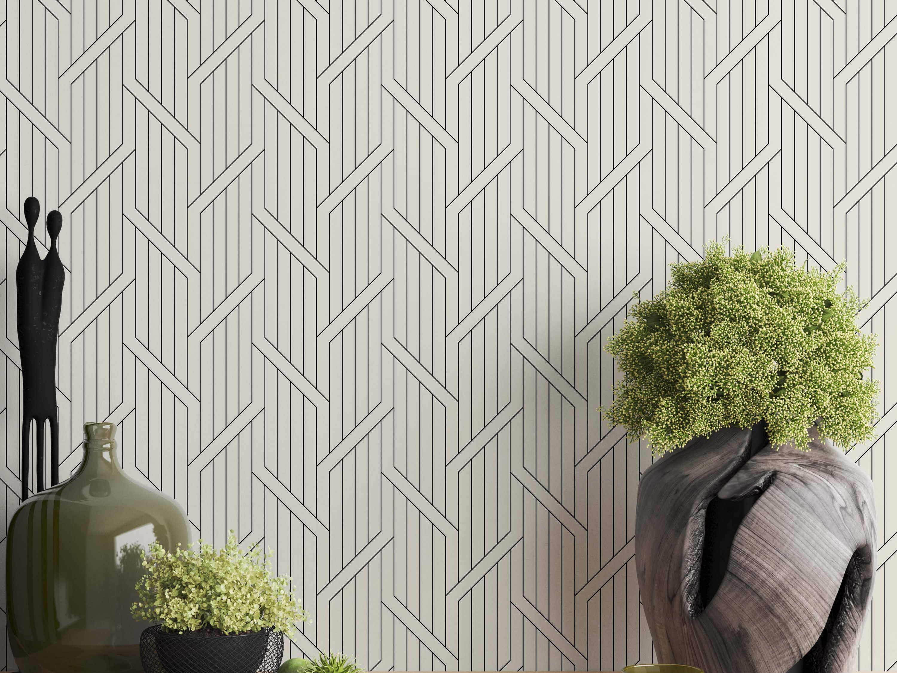 Geometric wallpaper with thin black intersecting vertical and diagonal lines forming a complex pattern on an off-white background.