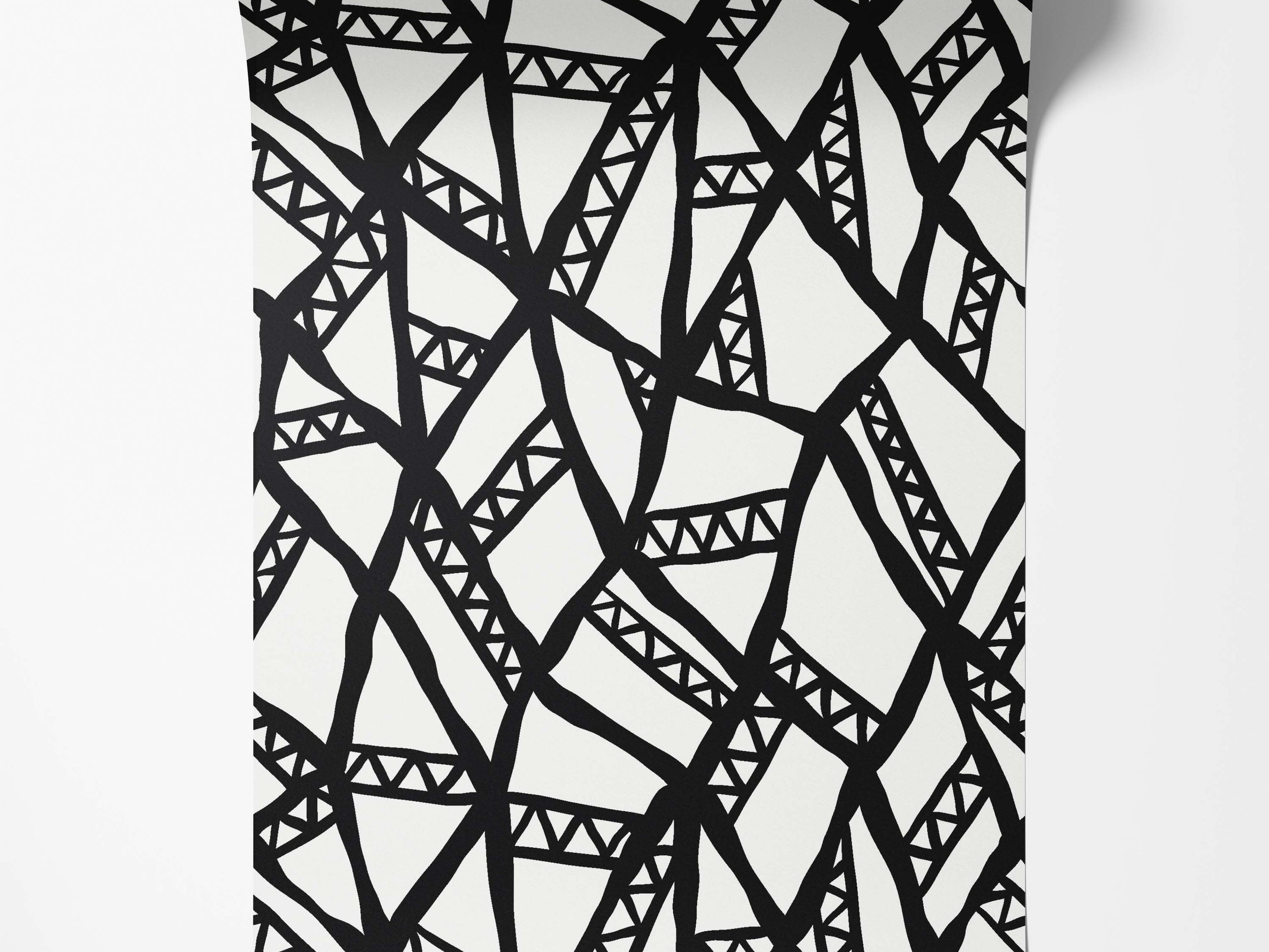 Abstract wallpaper featuring a network of bold, hand-drawn black lines with triangle motifs on a white field.