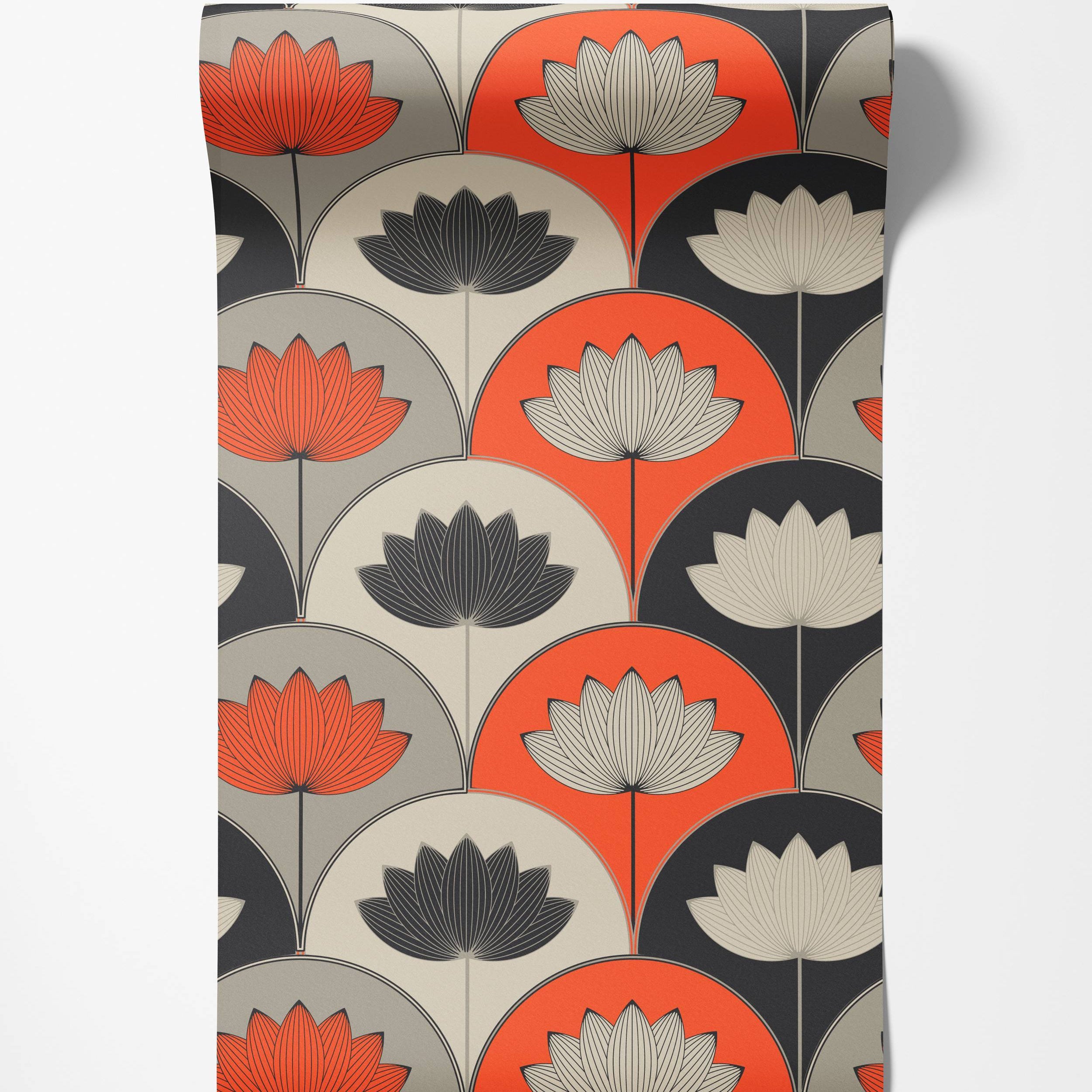 Art Deco wallpaper with a geometric fan pattern of stylized lotus flowers in orange, black, grey, and off-white.