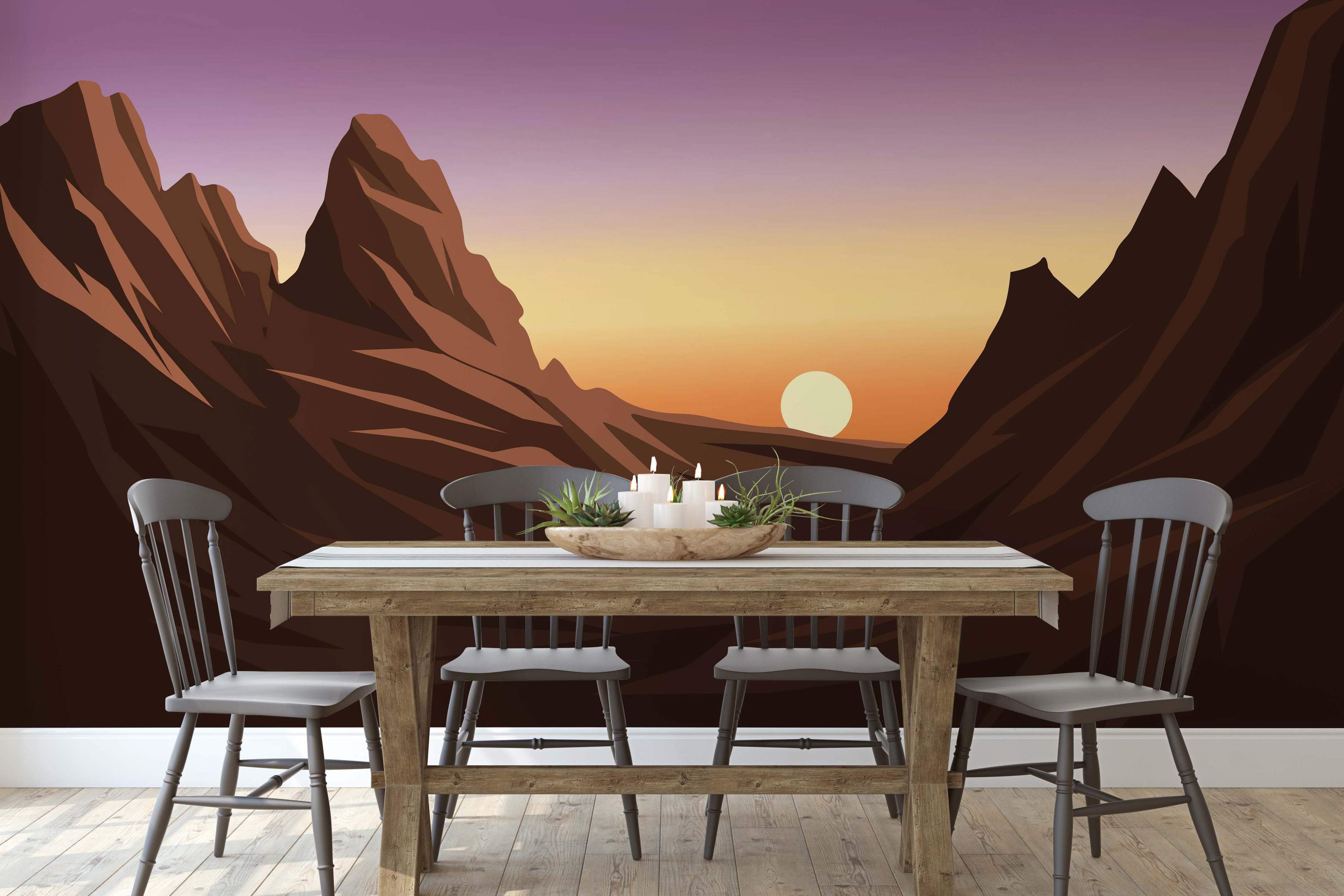 Geometric mountain mural featuring brown peaks against a purple, orange, and yellow gradient sunset sky with a round sun.