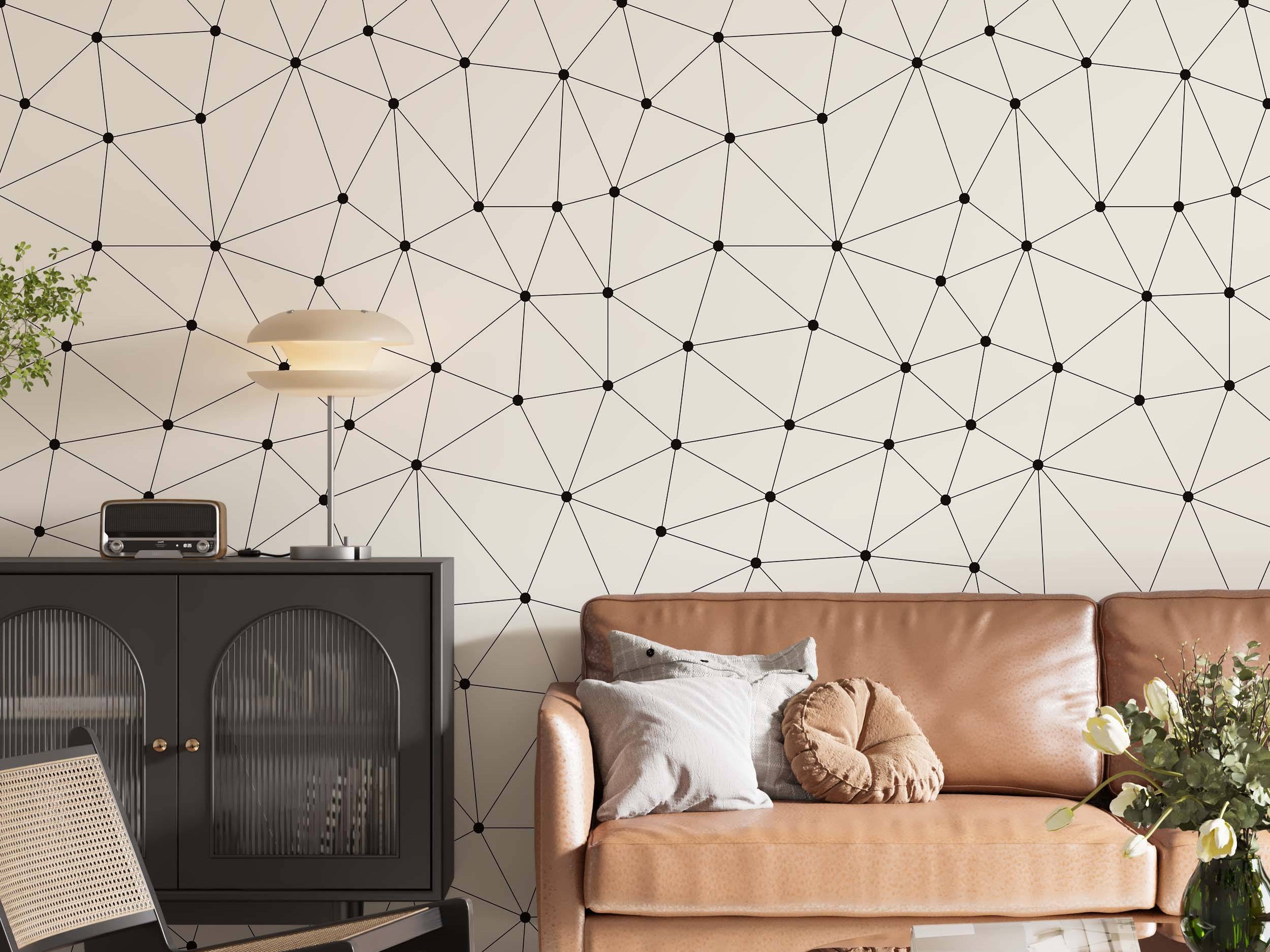 Geometric network wallpaper featuring black dots connected by fine black lines, forming triangles on a light cream background.