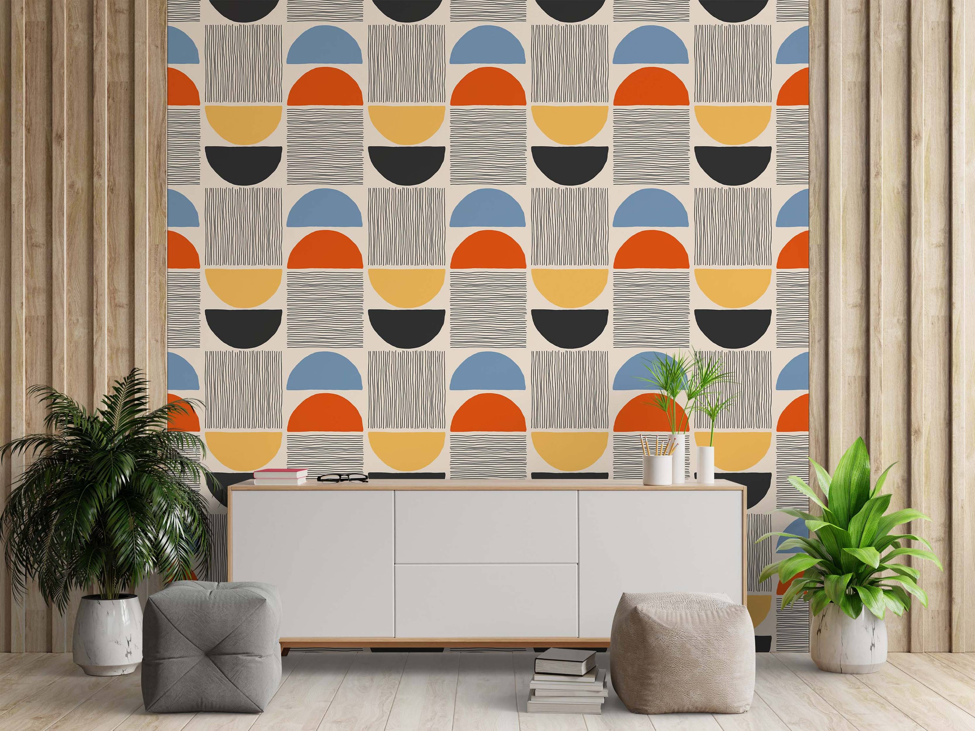 Geometric wallpaper featuring repeating semi-circles in blue, orange, yellow, and black, paired with blocks of fine lines.